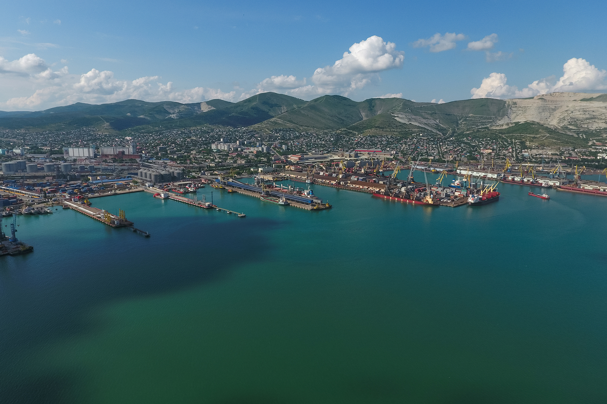 industrial seaport, top view. port cranes and cargo ships and ba