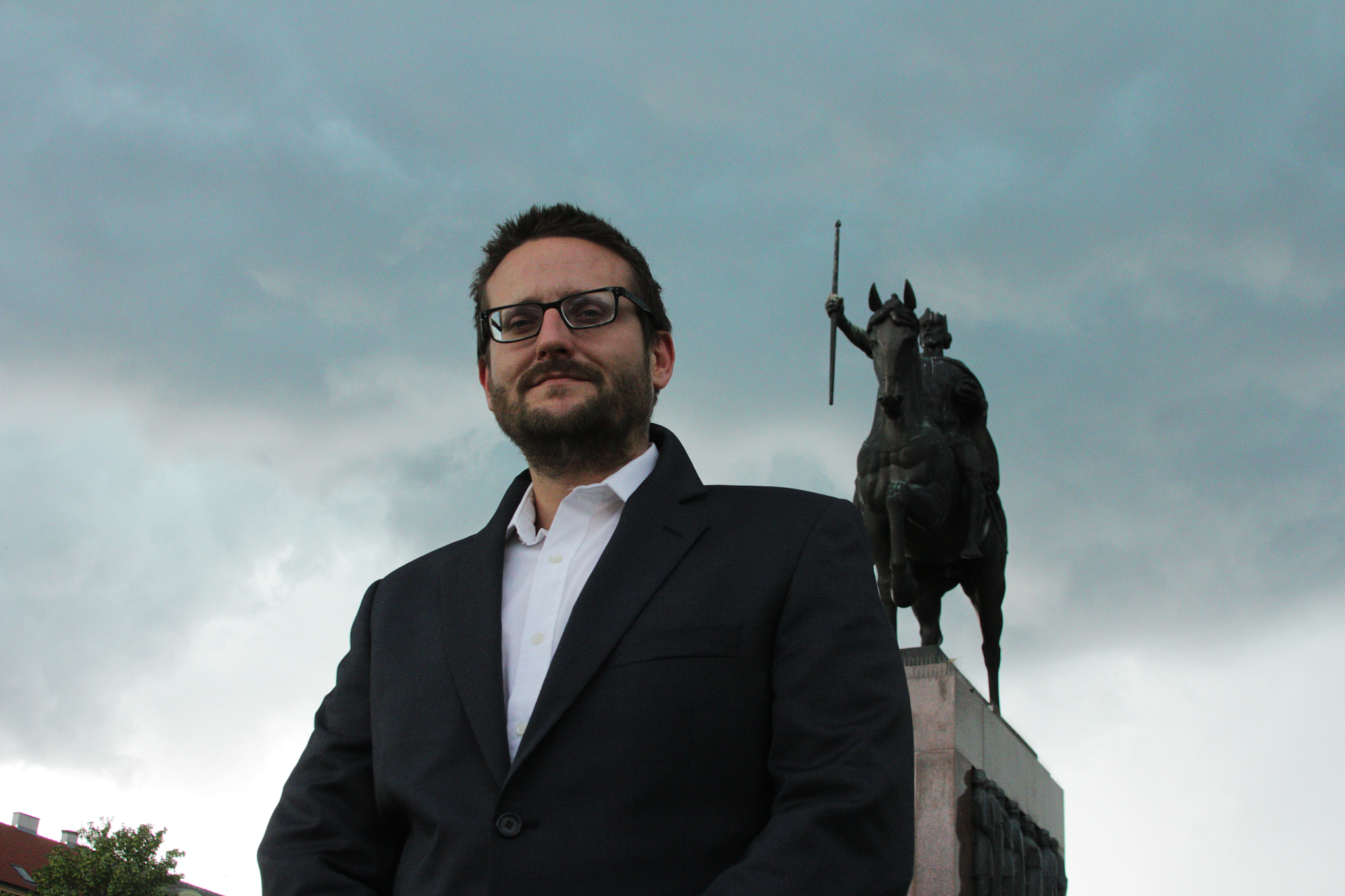 portrait of smiling man against sky
