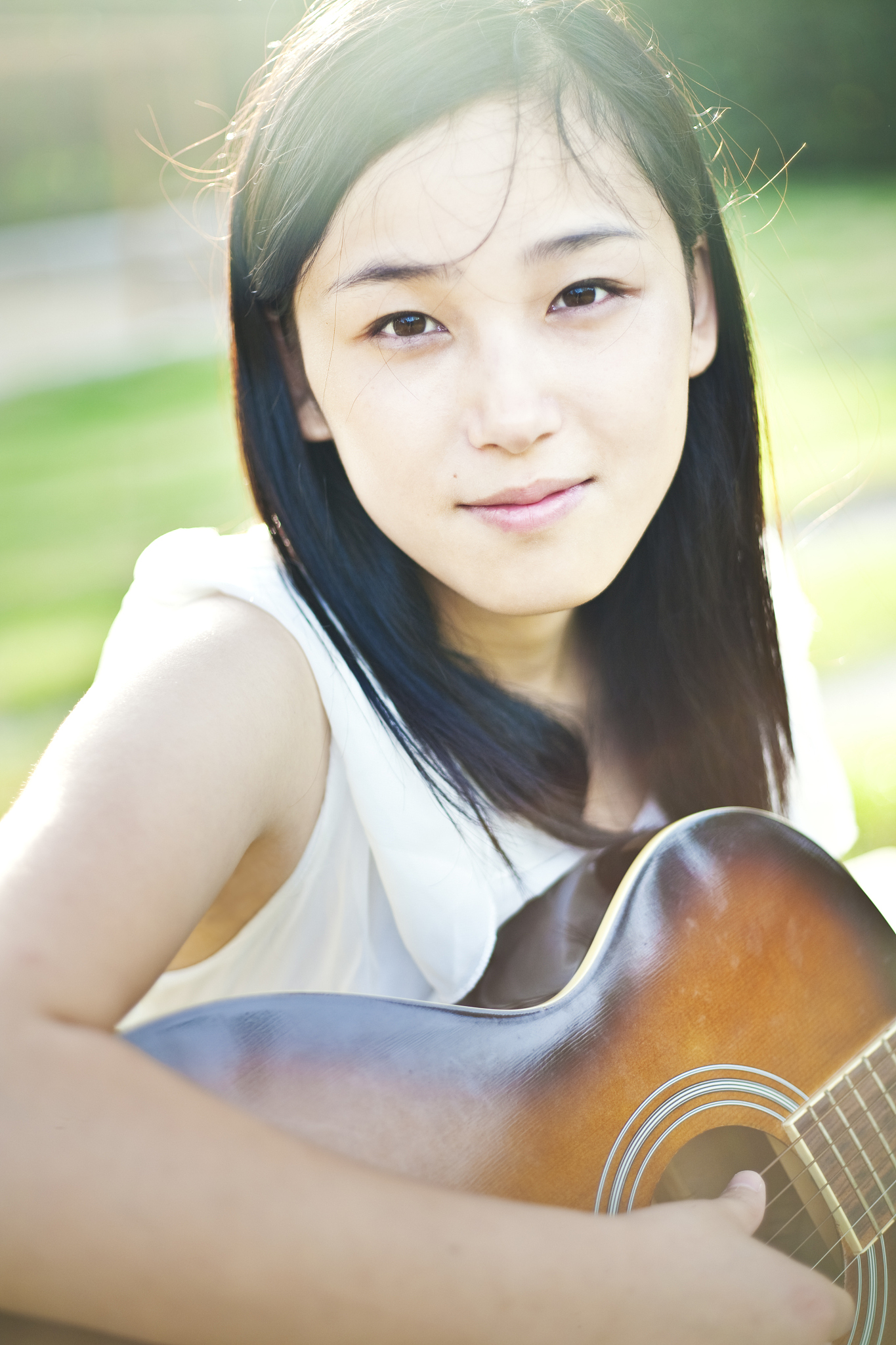 girl playing guitar
