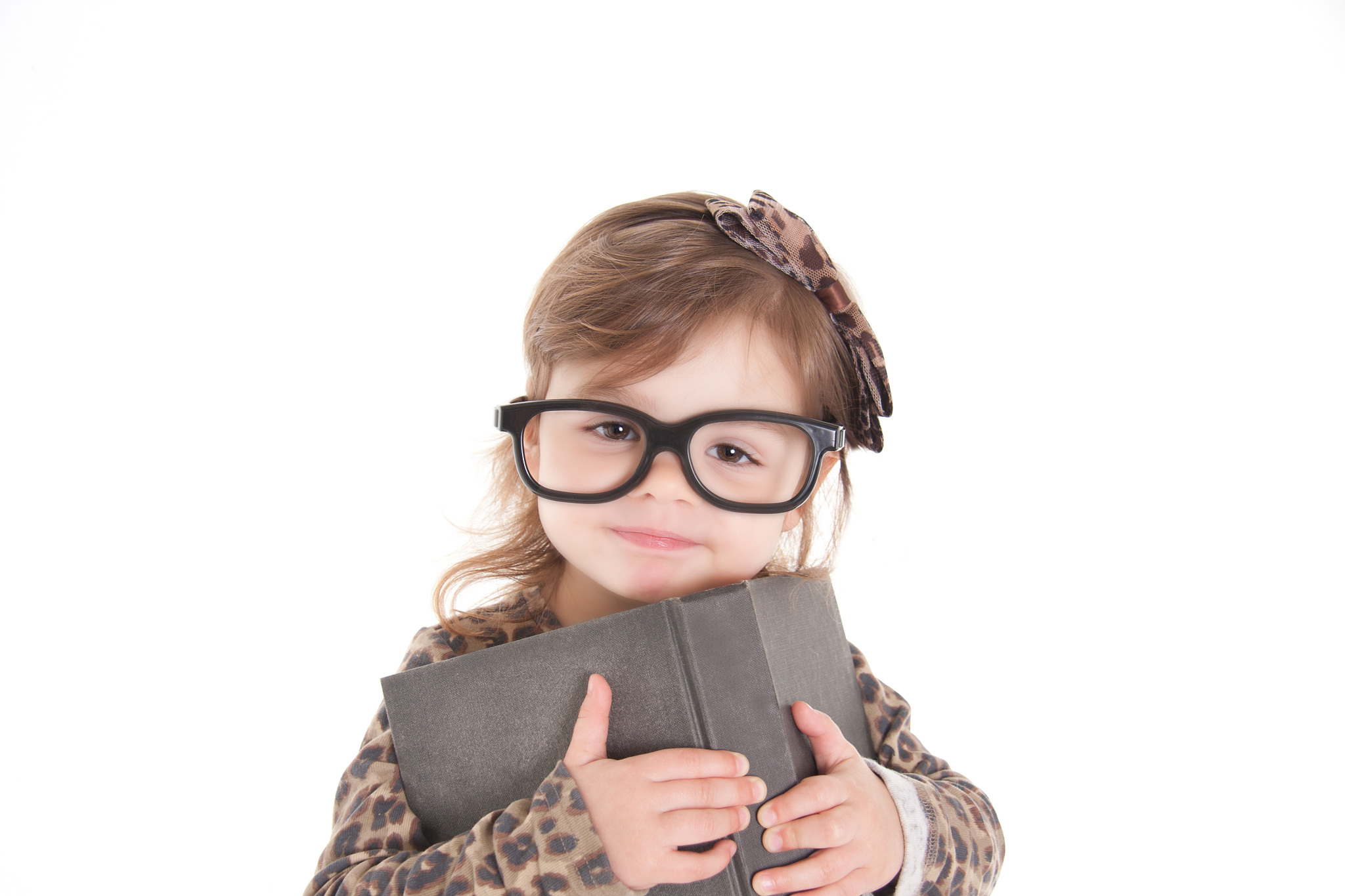 child holding a book