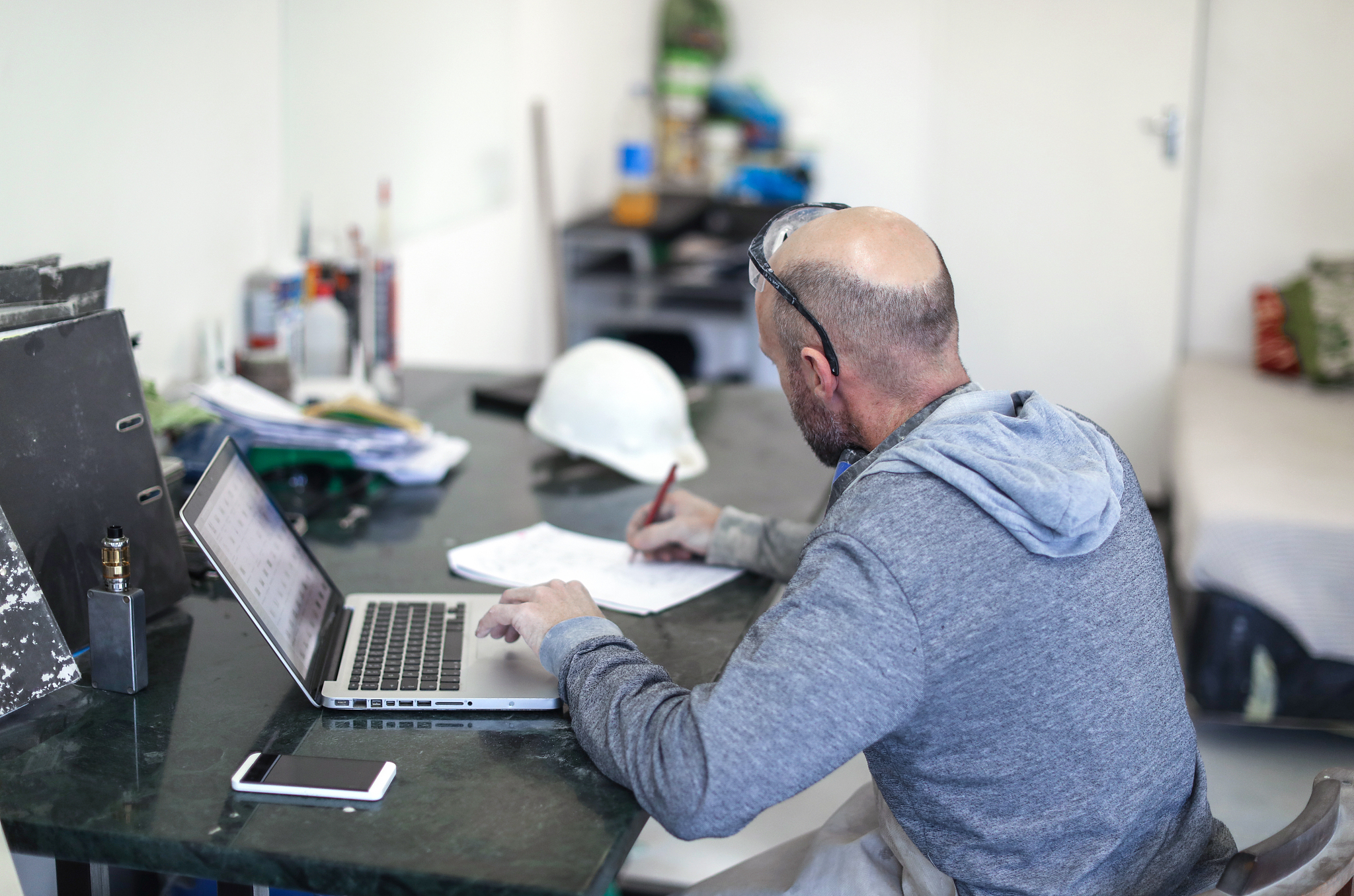 worker planning in his workshop.
