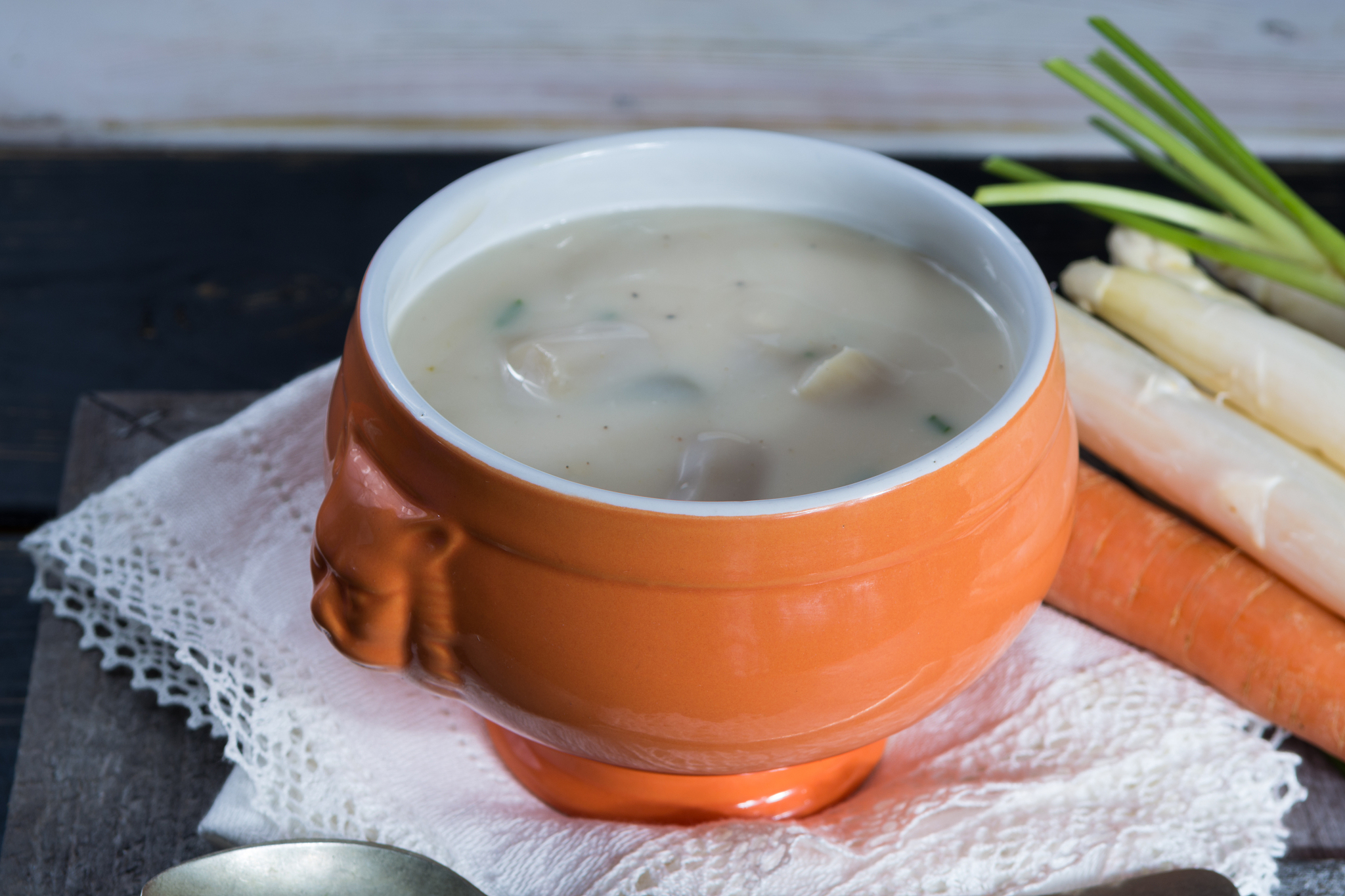 spring season - white dutch asparagus soup, ready to eat served 
