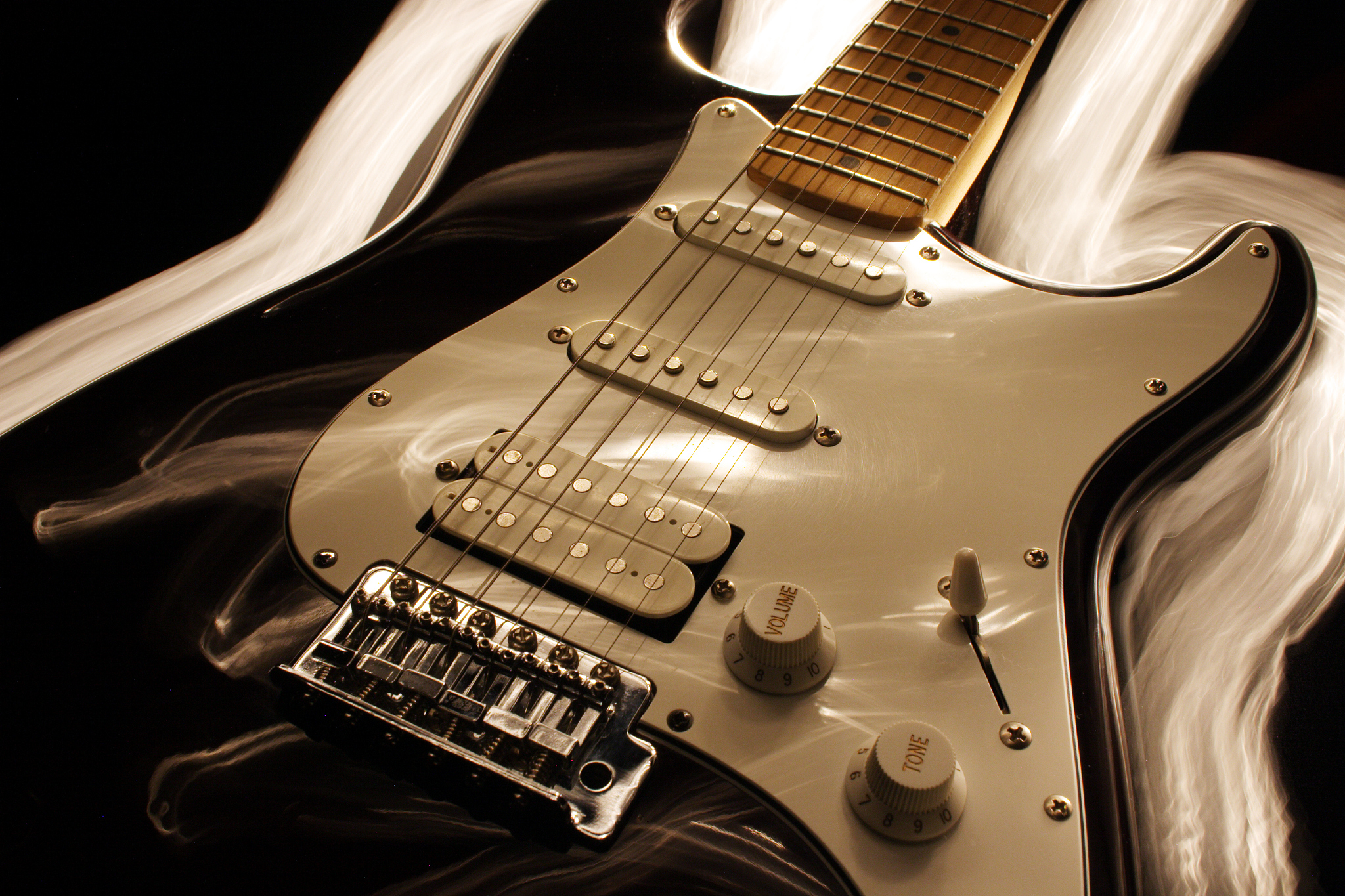 black guitar with lighting affects
