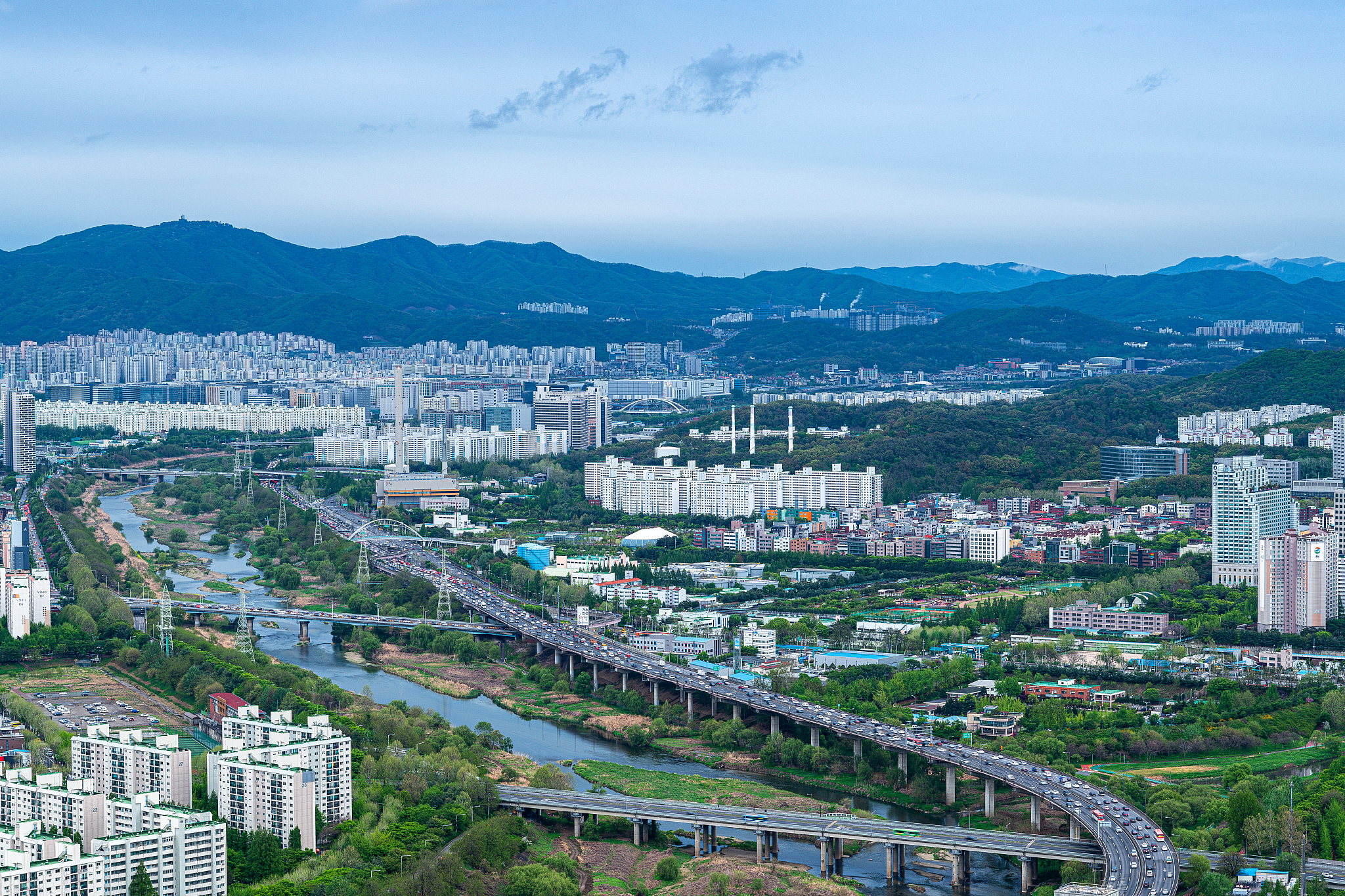 photography of landscape of seoul city with river, roads and bui