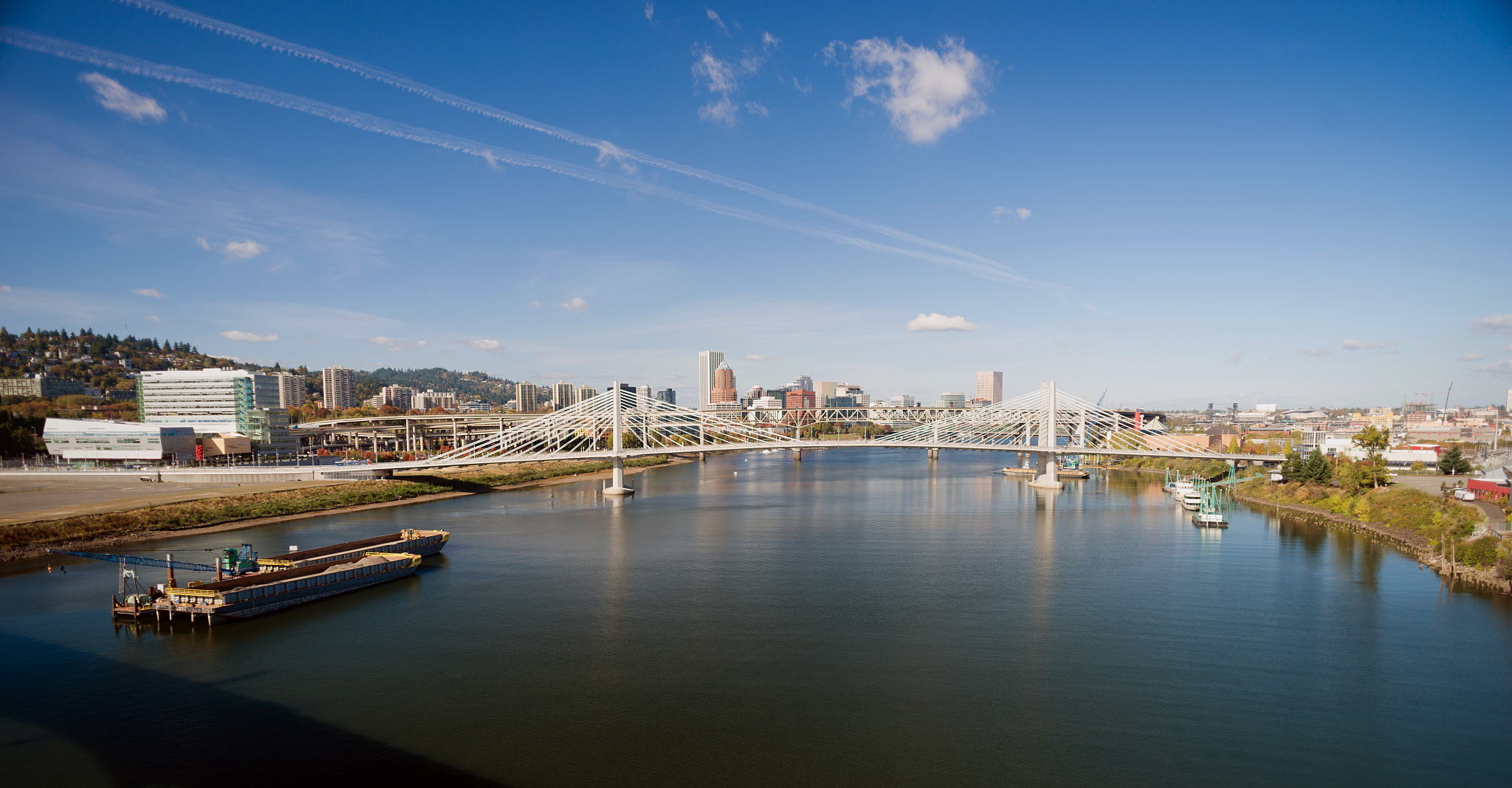 panoramic view portland bridge willamette river barges