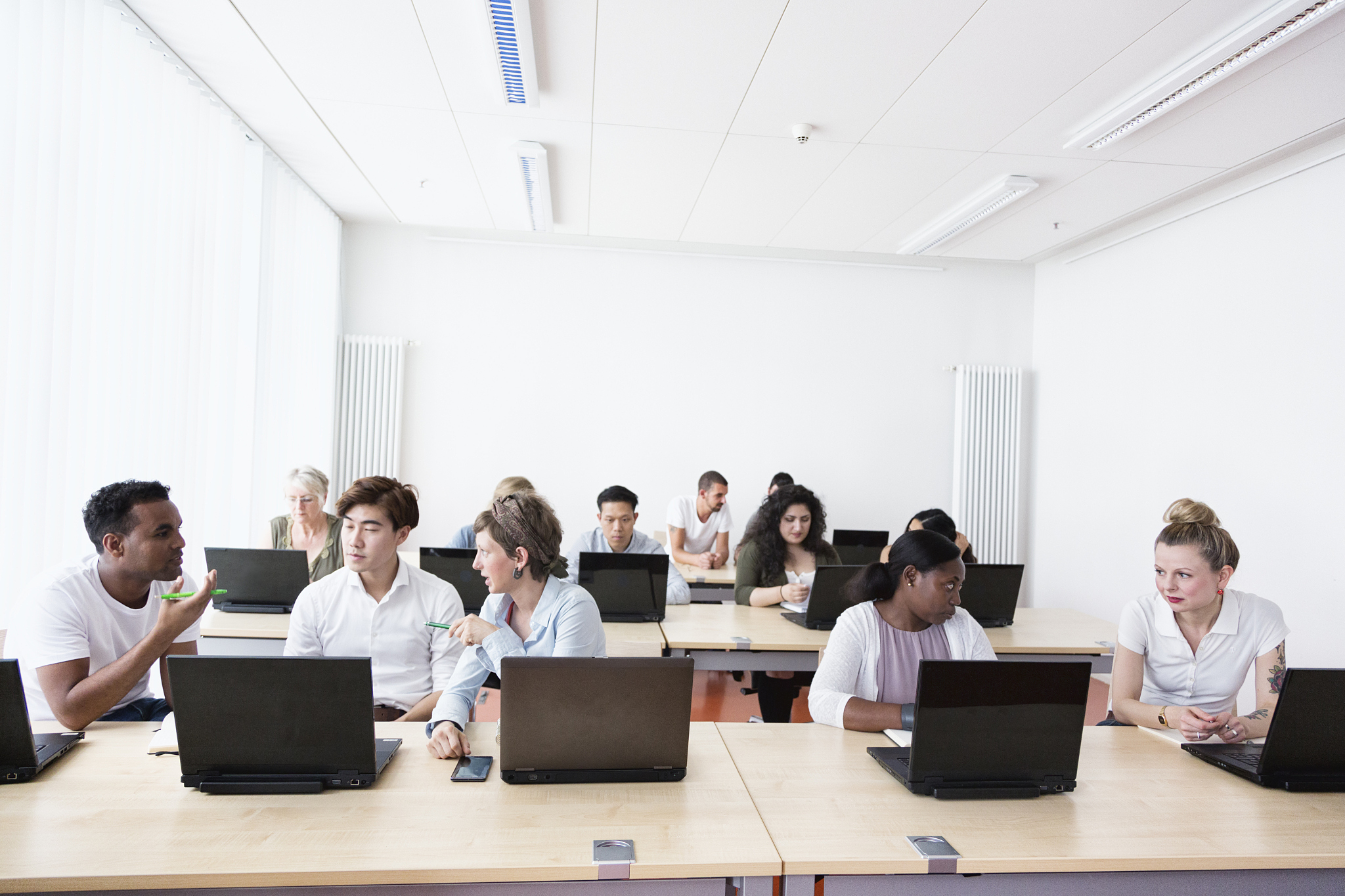 training class students learning at pc discussion