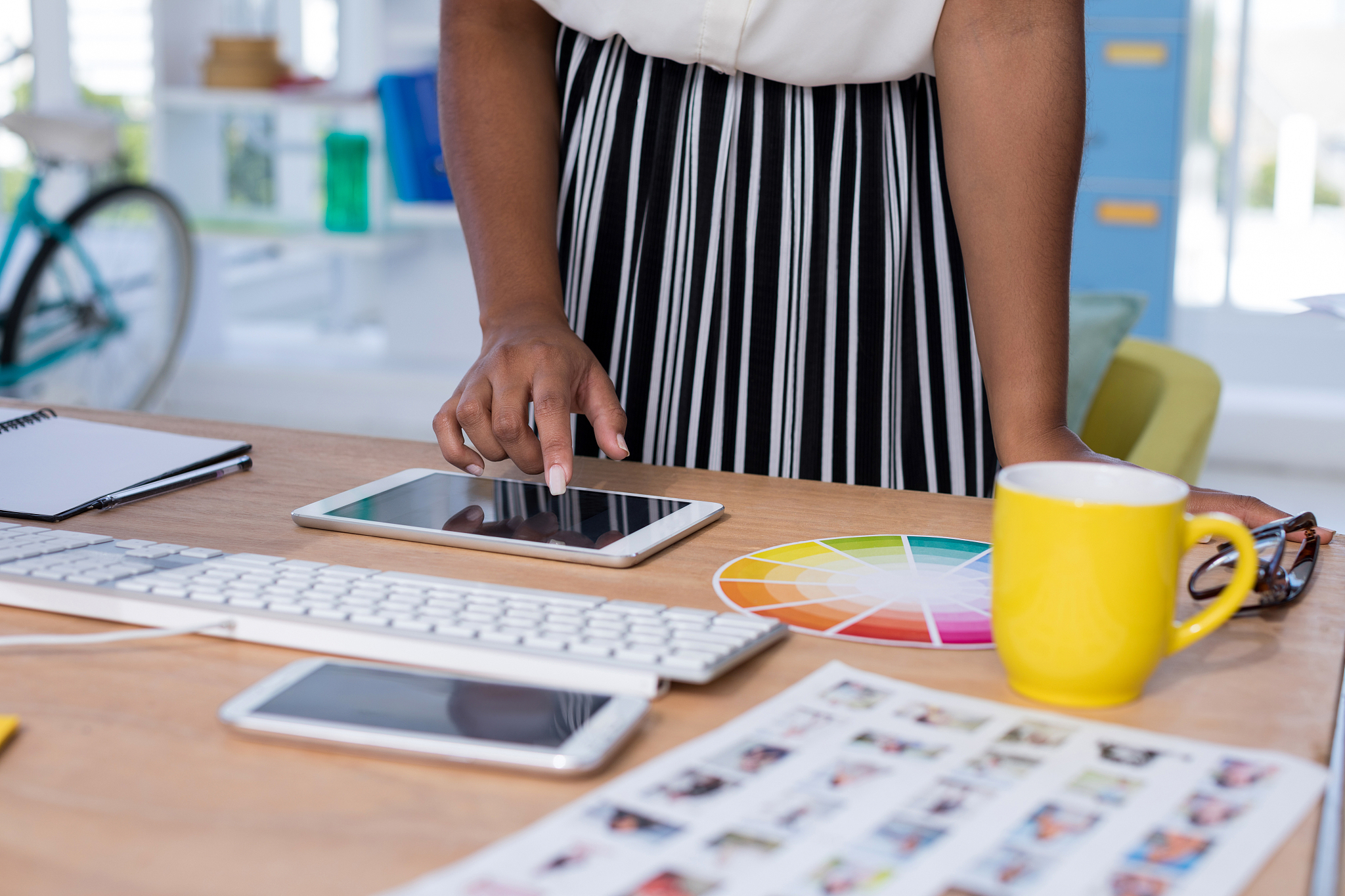 female designer using digital tablet in office