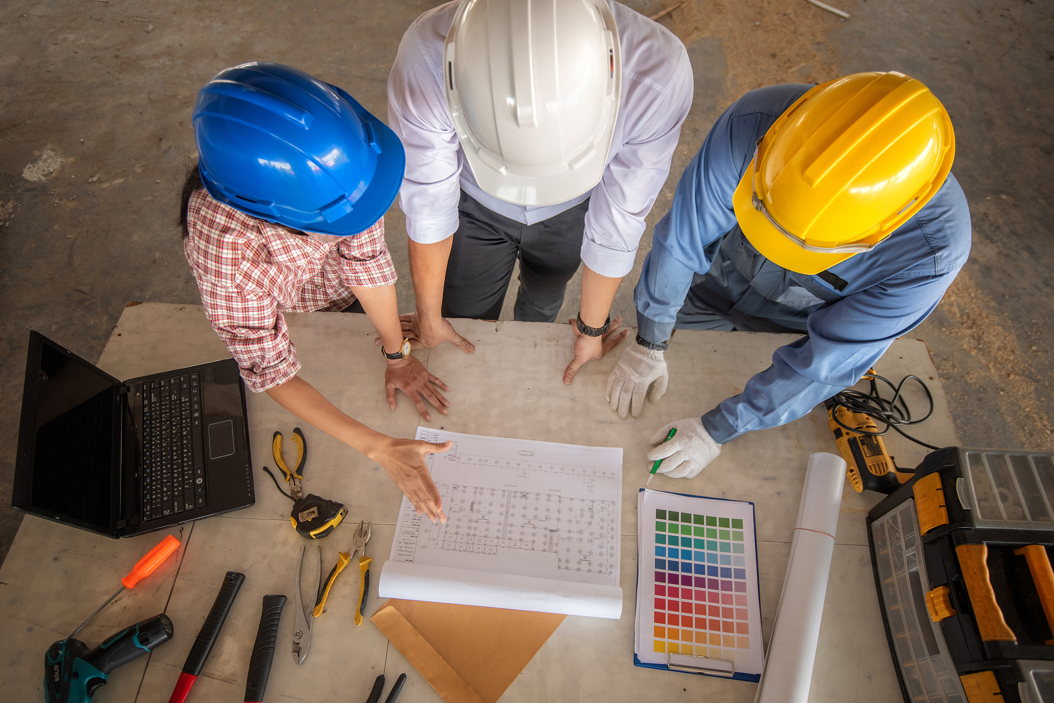 high angle view of architects working at construction site