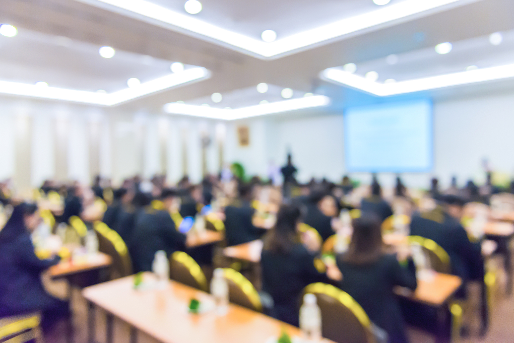 blur of business conference and presentation in the conference h