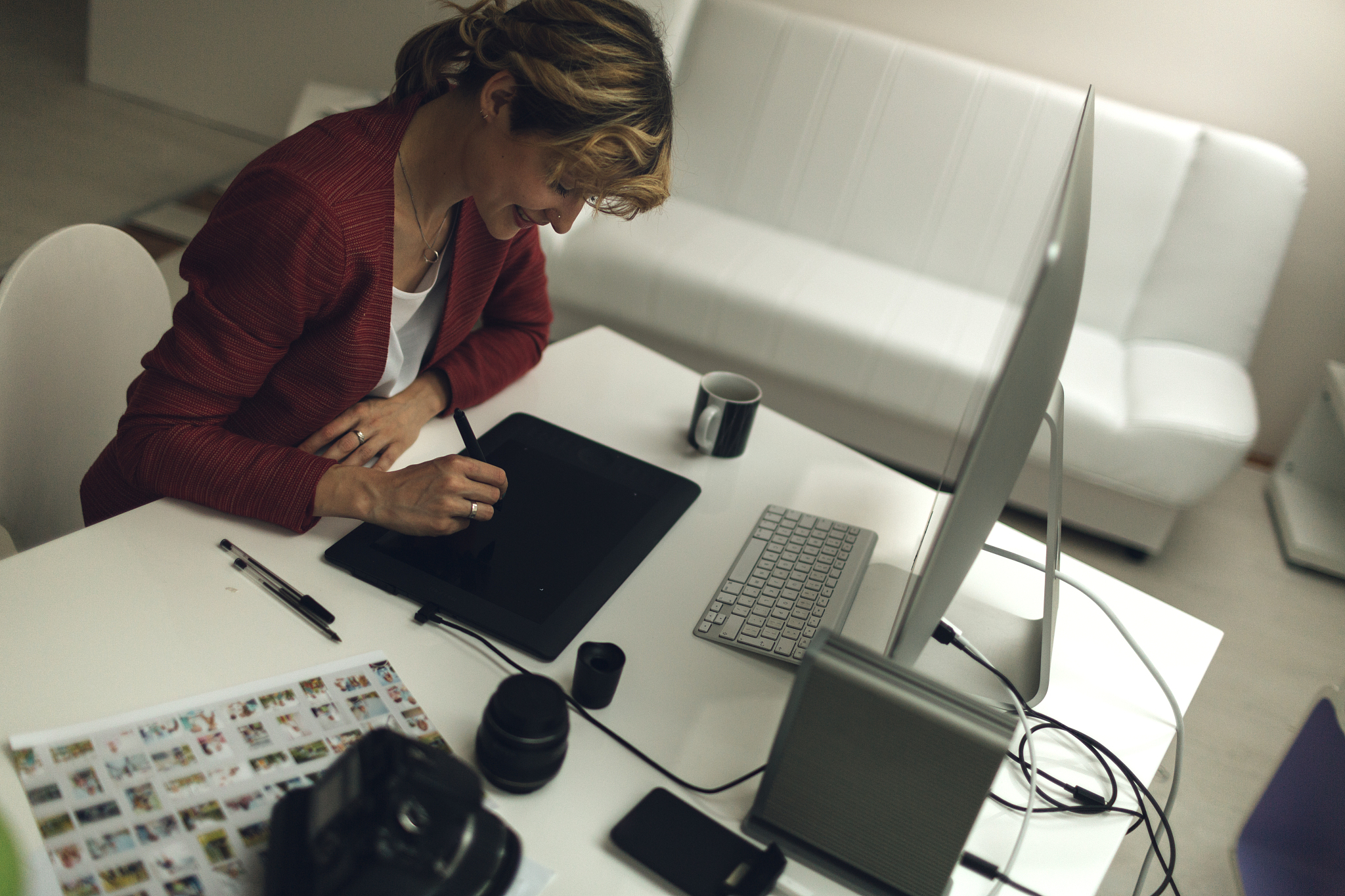 photographer working in her office