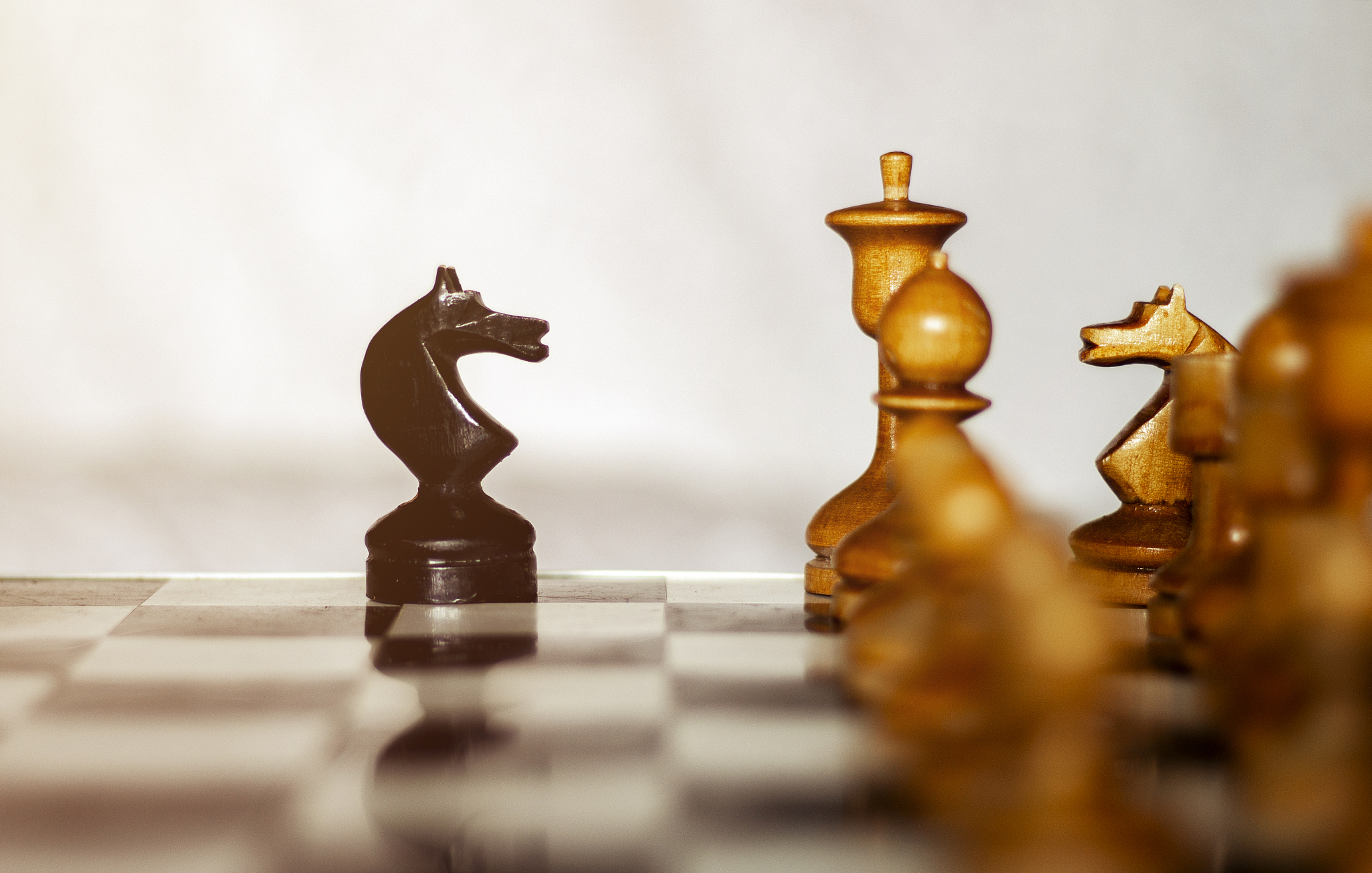 beginning of the game. two chess teams in front of different col