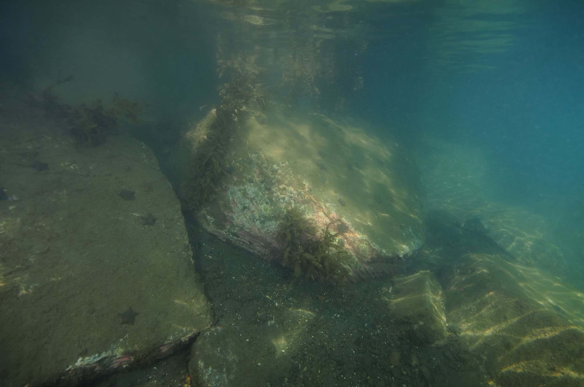 large rocks under water surface
