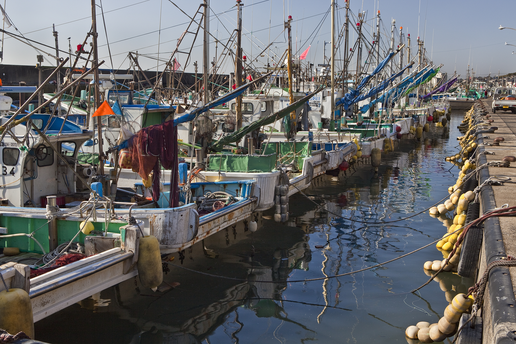 row of commercial fishing boats