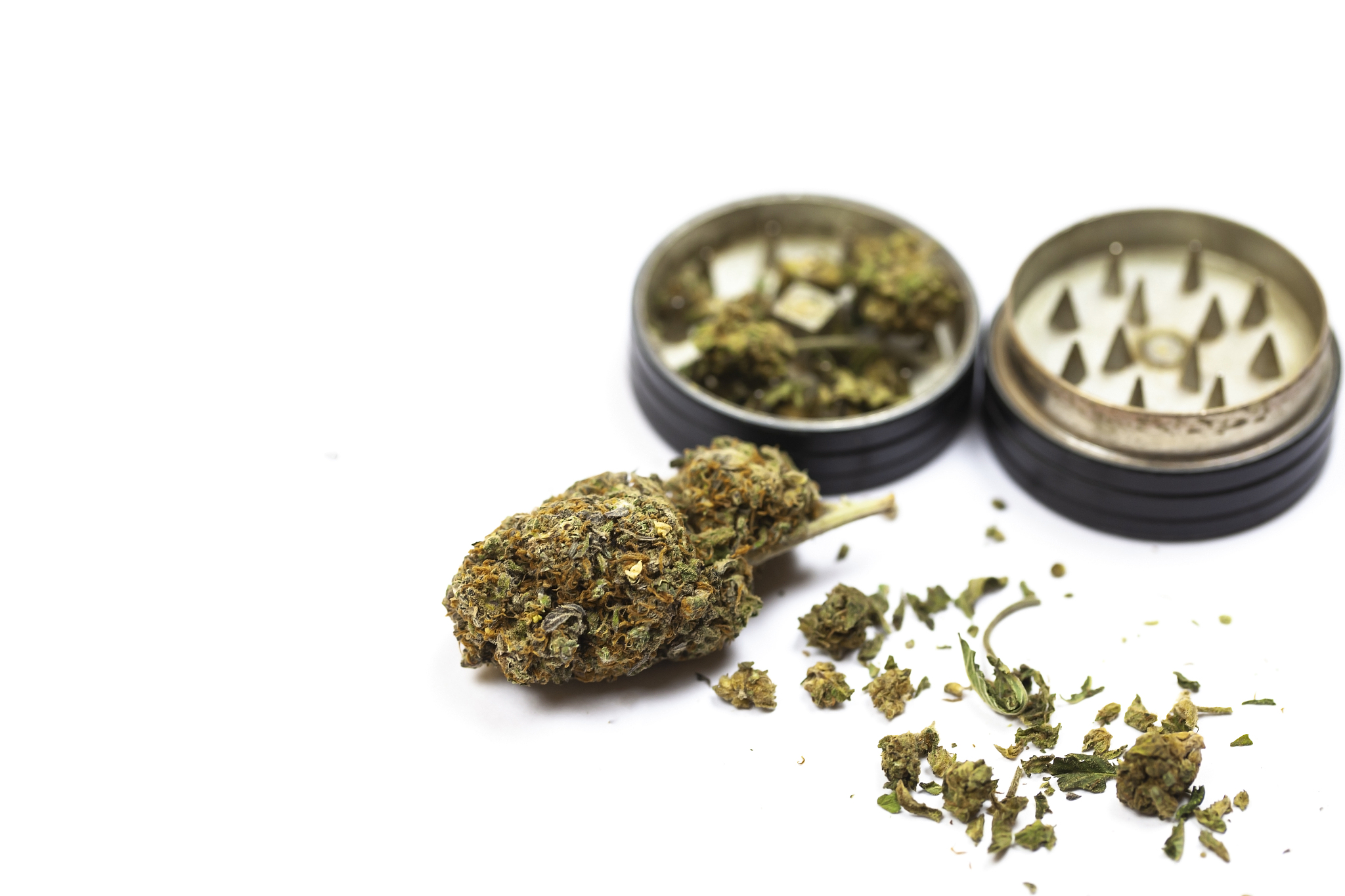 marijuana with mill on a white background
