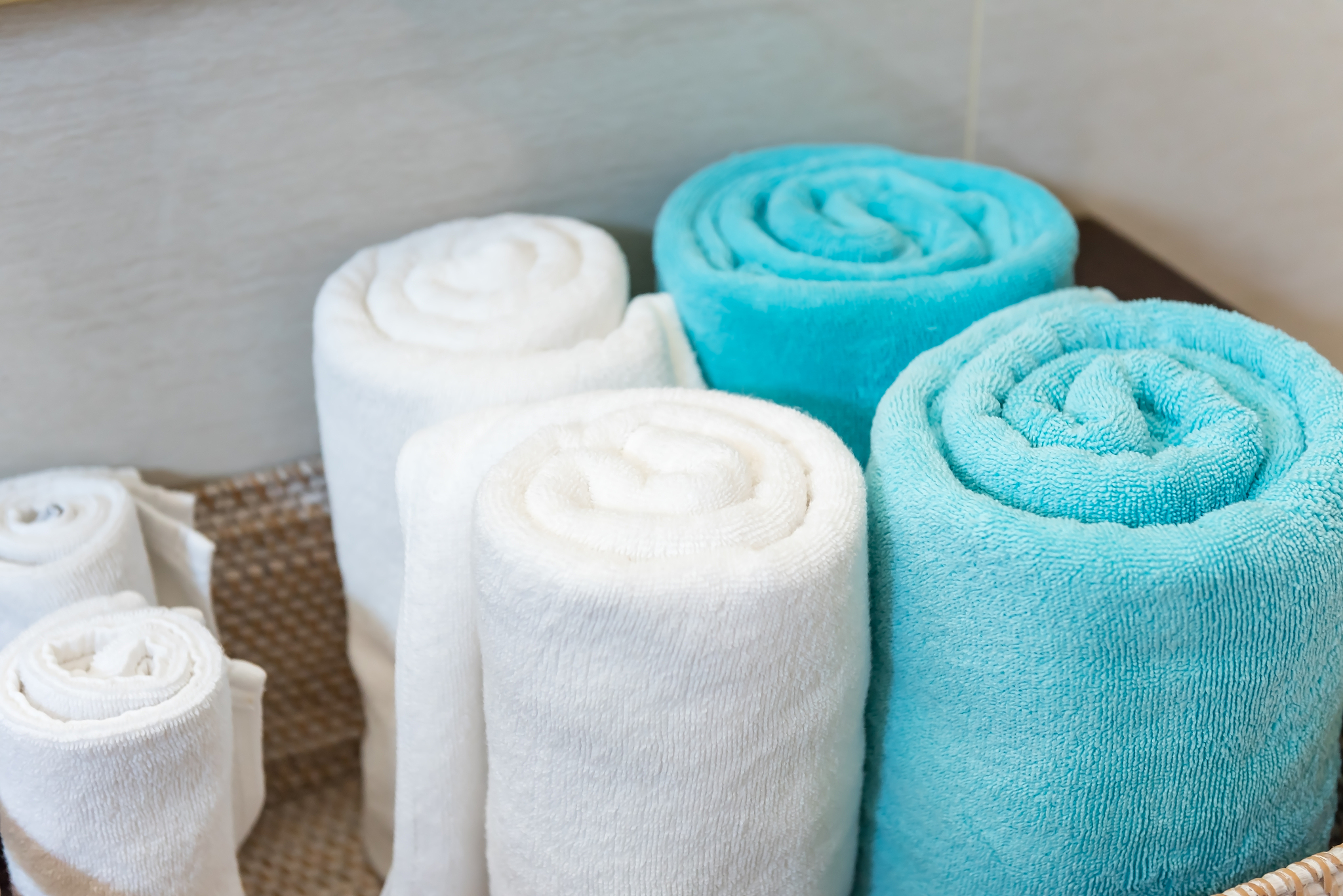 folded white and blue towel