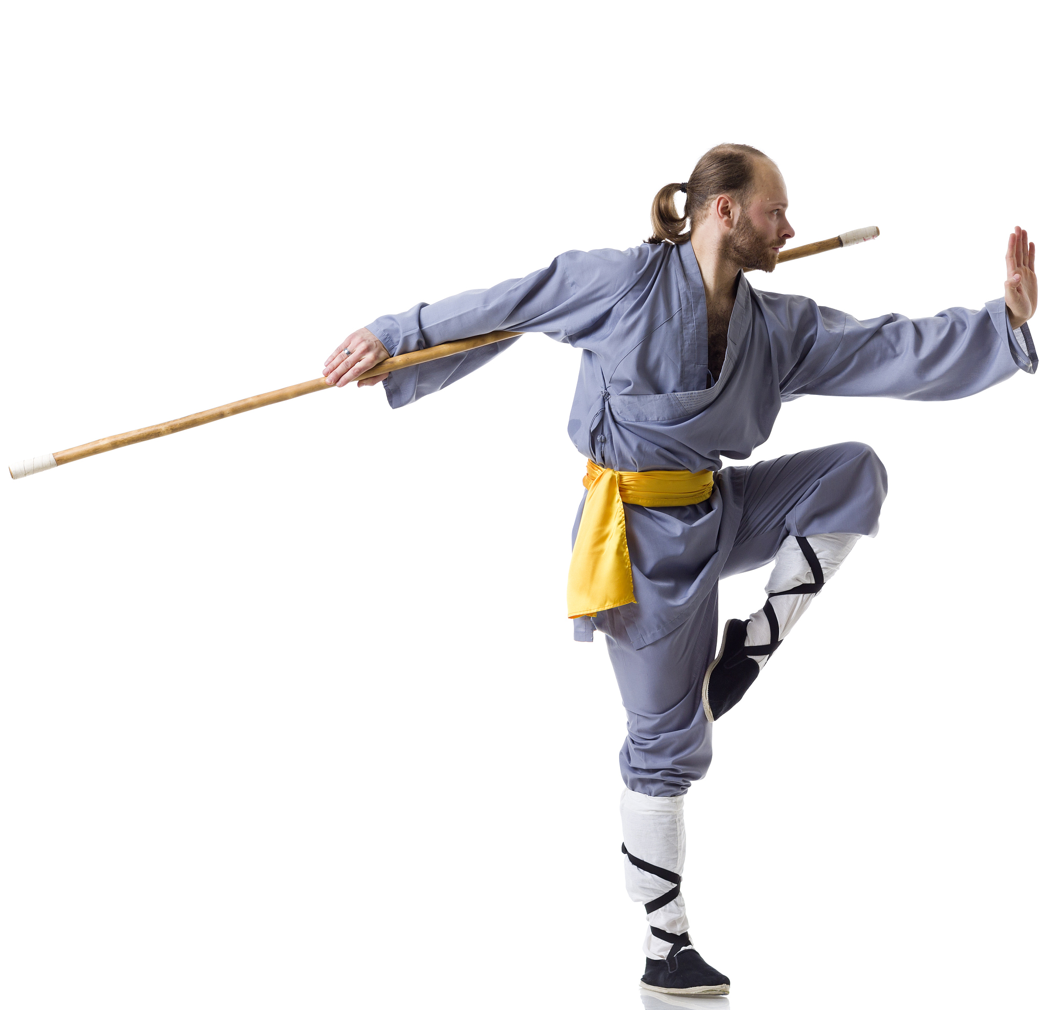 kung fu fighting position with wushu cudgel isolated on white