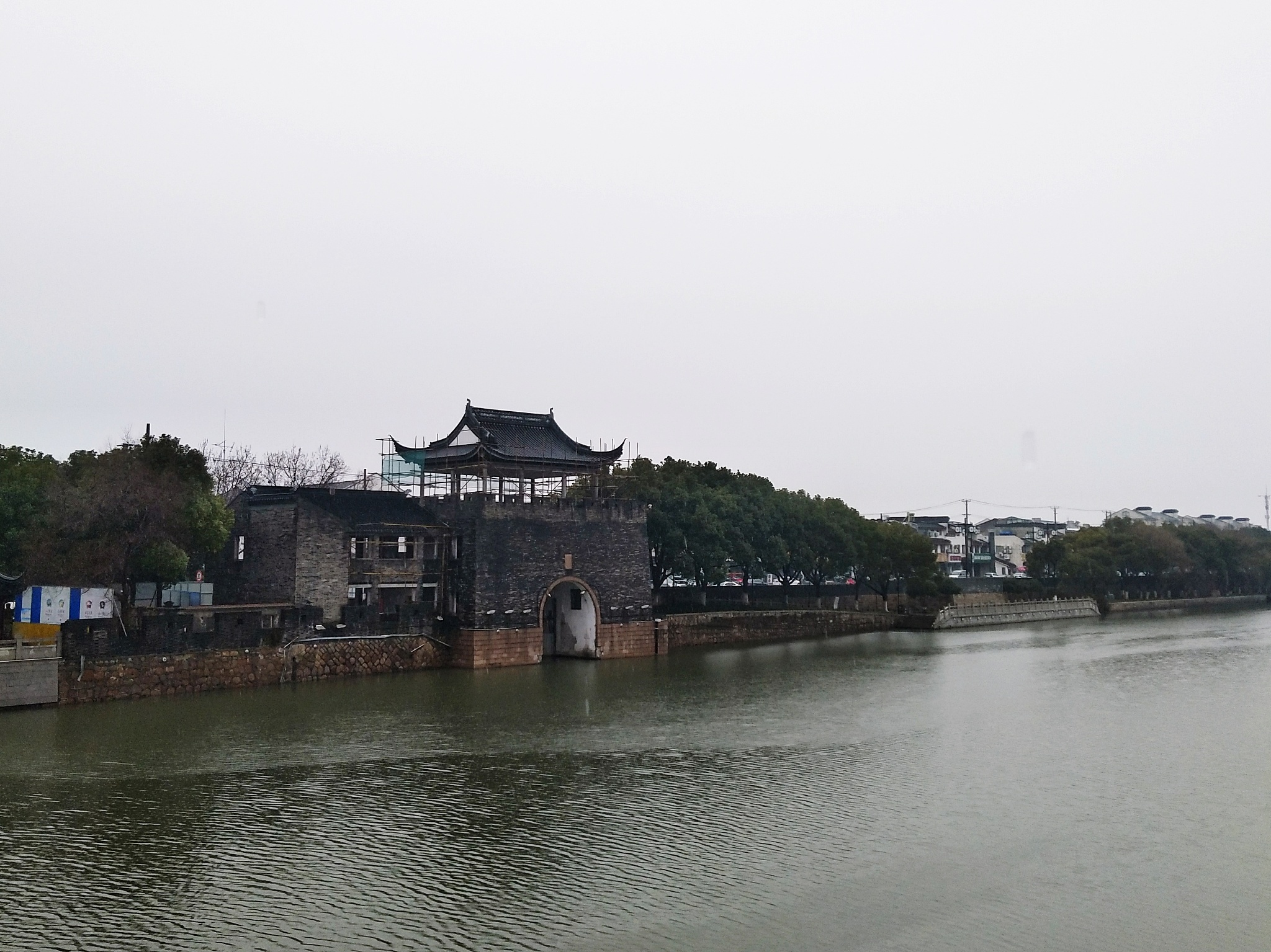 view of bridge over river against buildings