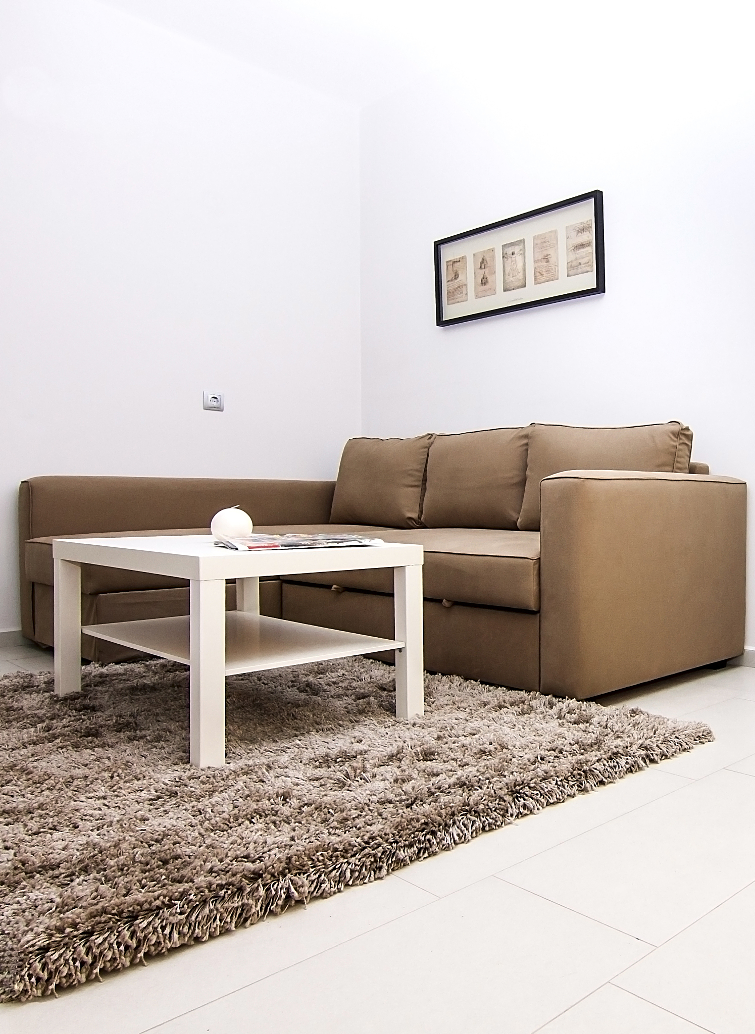 beige sitting group in big living room.