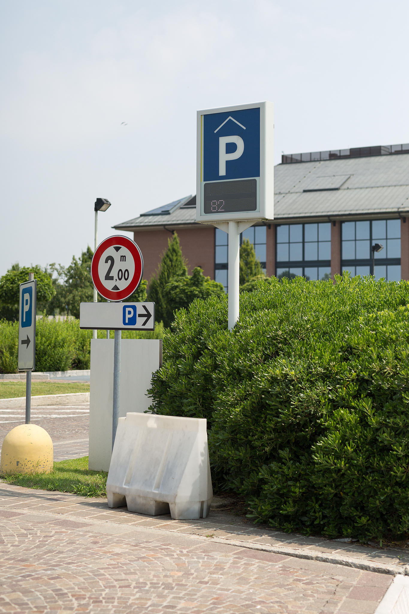 some road signs indicating a parking area