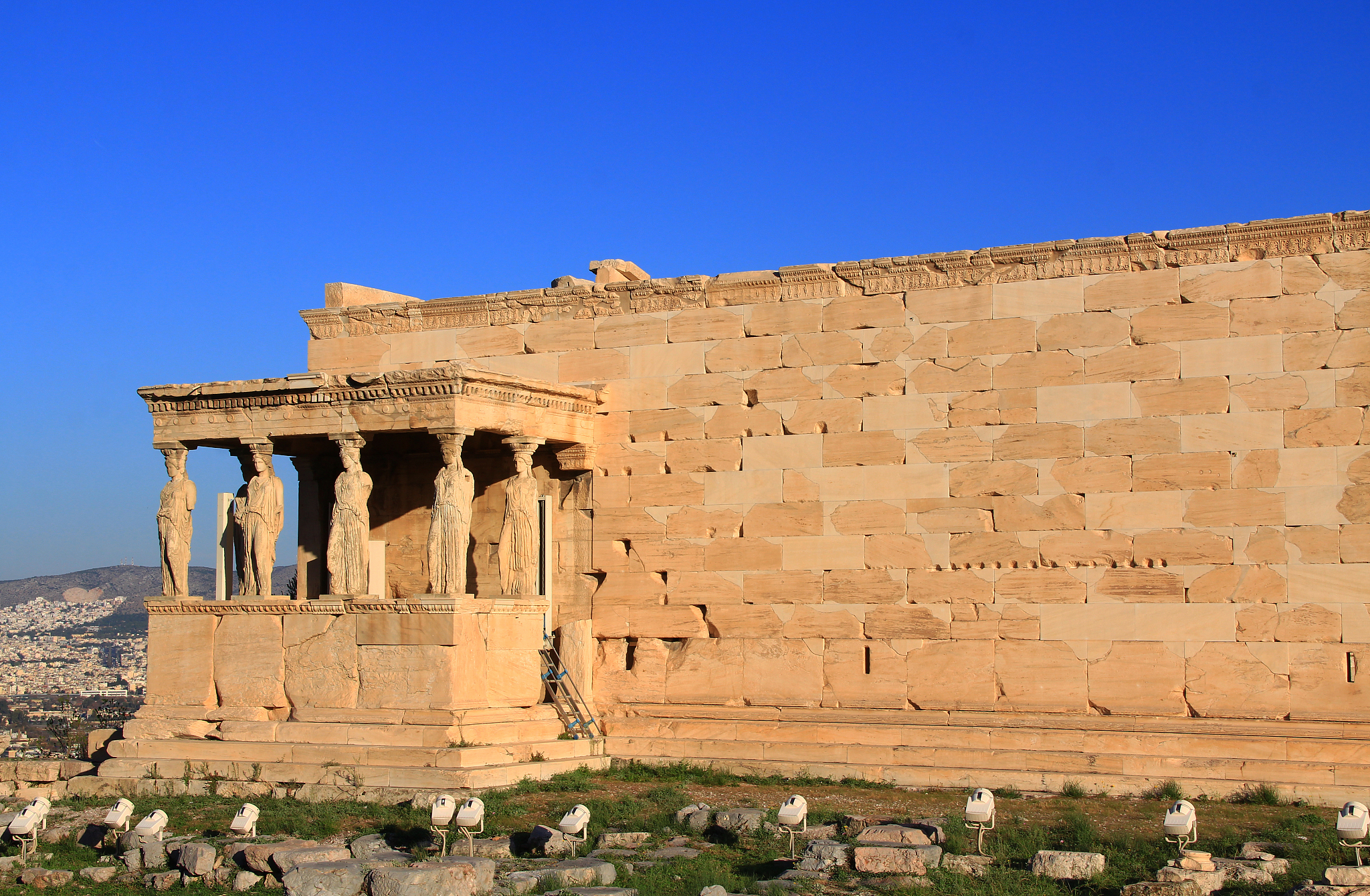 caryatid statues on the porch of the erechtheion in athens, gree
