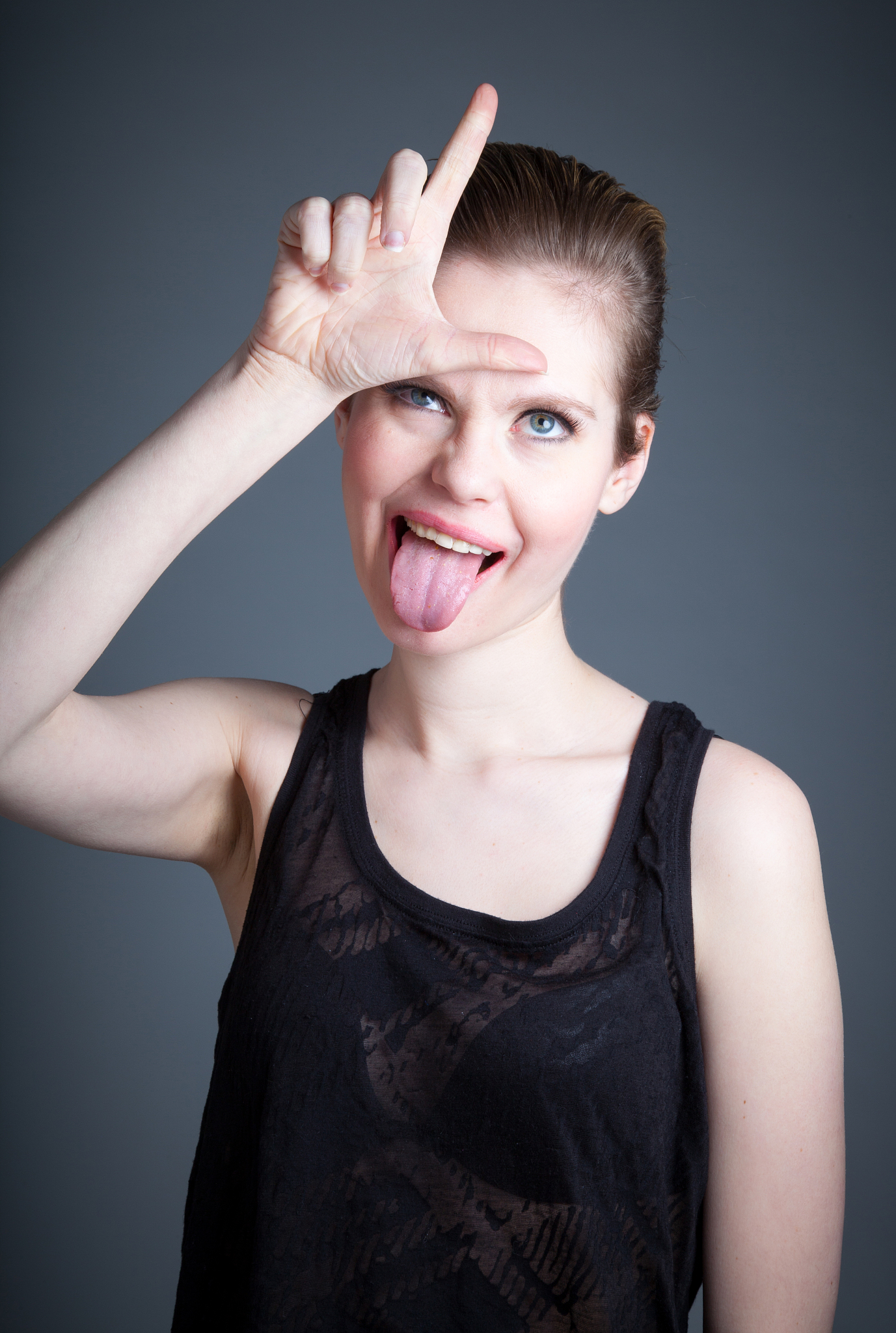 attractive woman isolated on grey background