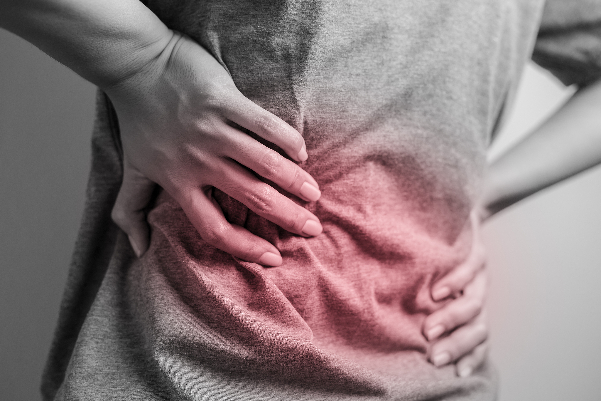 woman with pain in the waist.