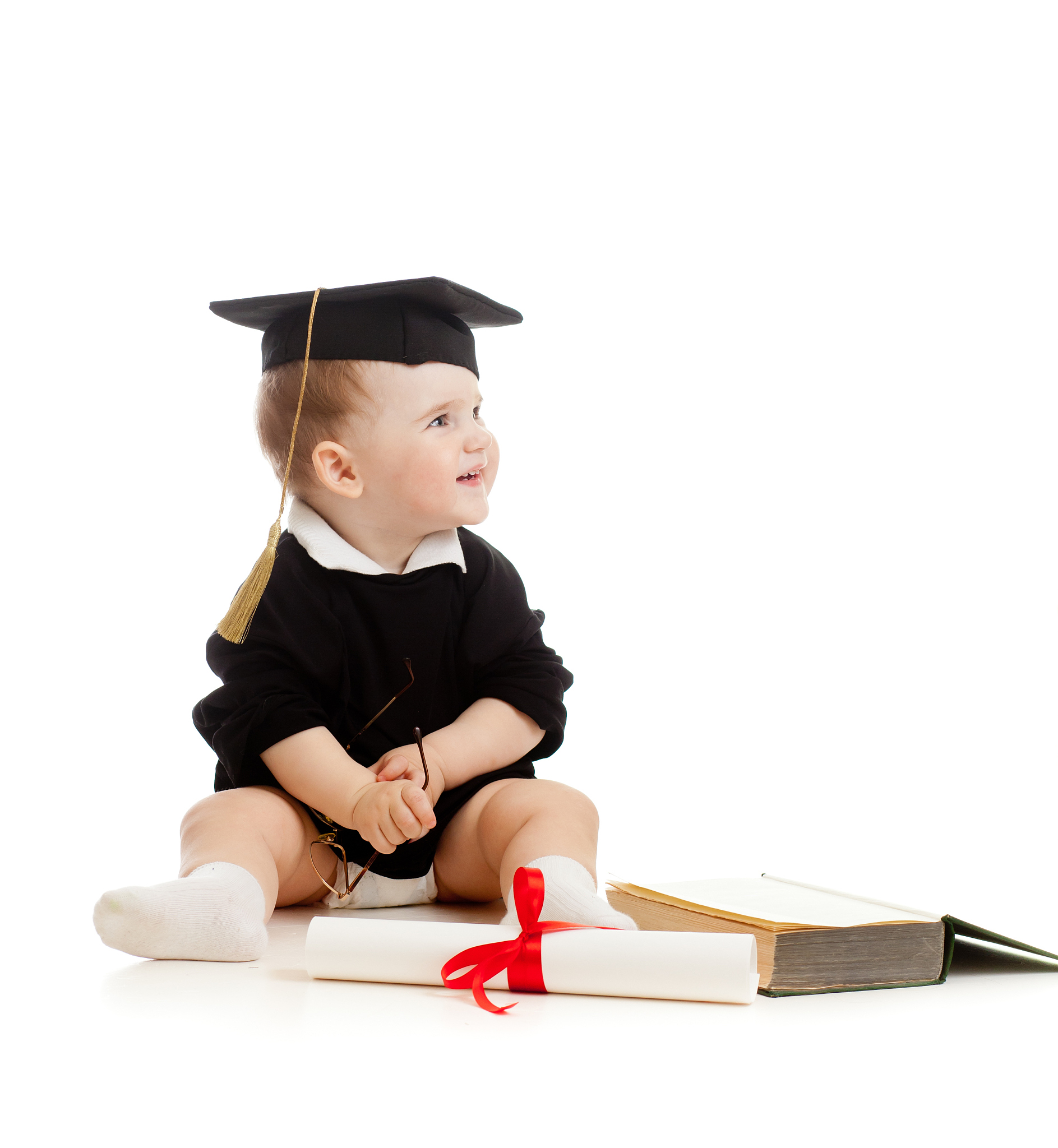 baby in academician's clothes  with roll and book