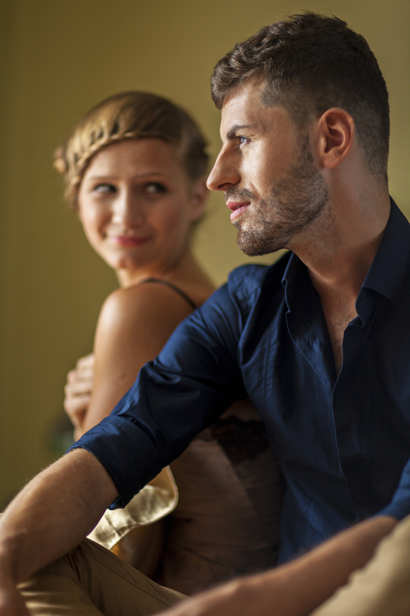 man and woman in hotel room