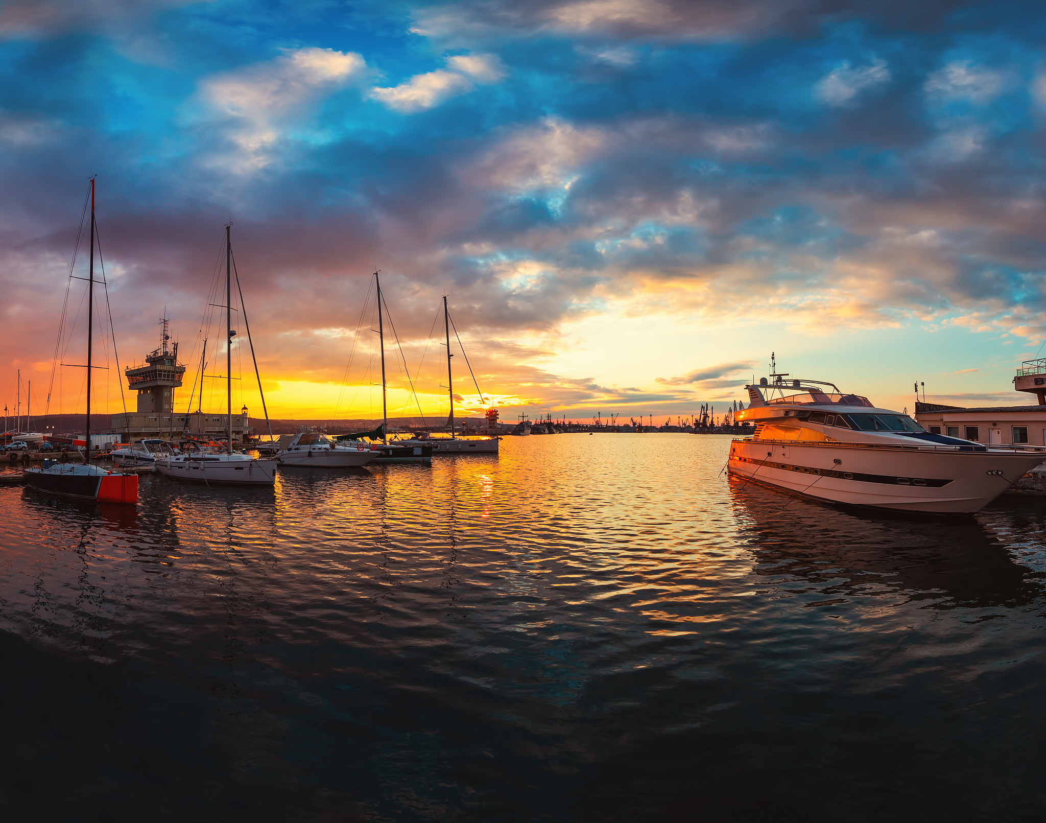 yacht port and beautiful sunset over varna, bulgaria. sailboat h