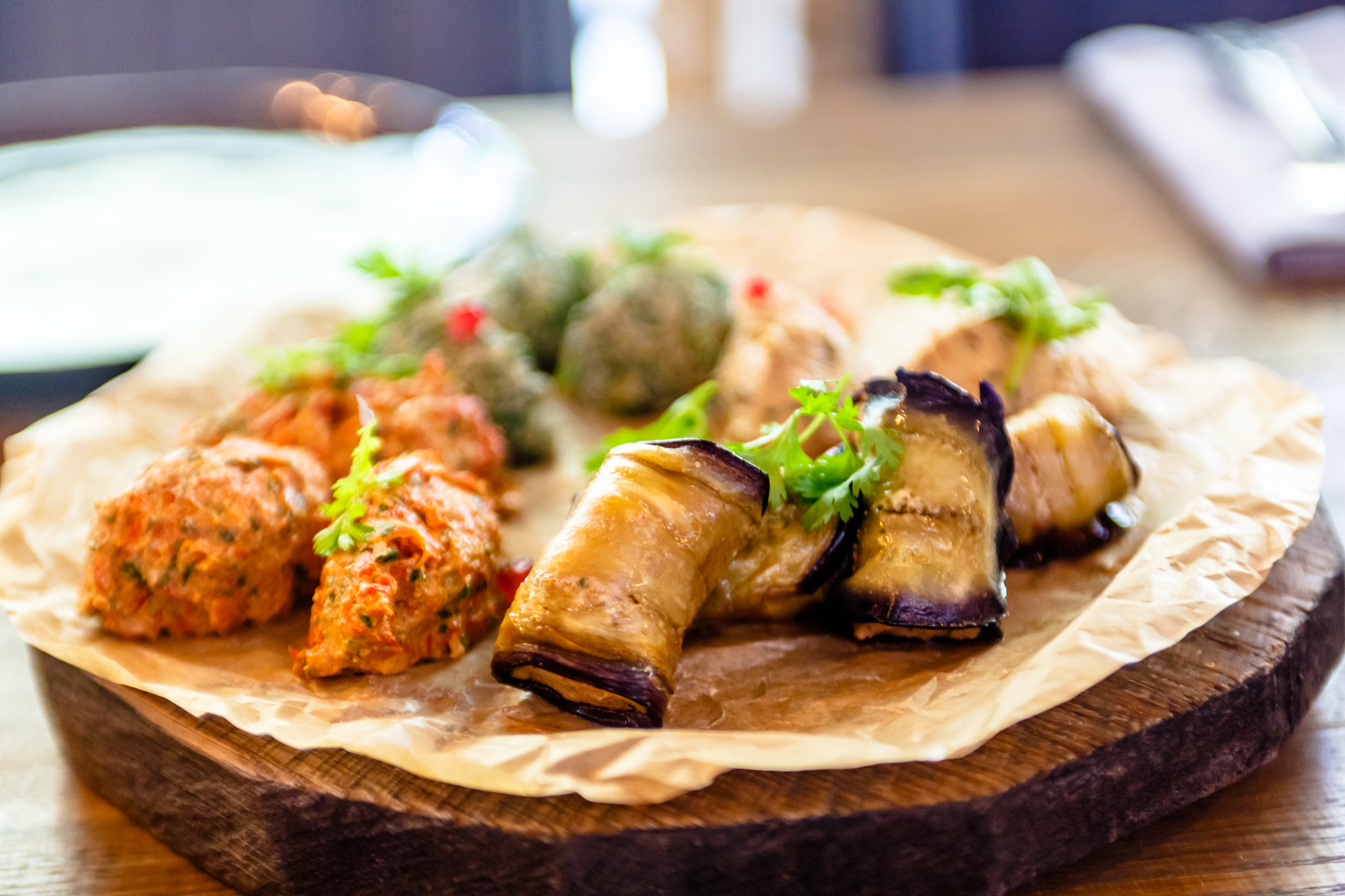 traditional georgian cuisine snacks - rolls of eggplant and 'pha