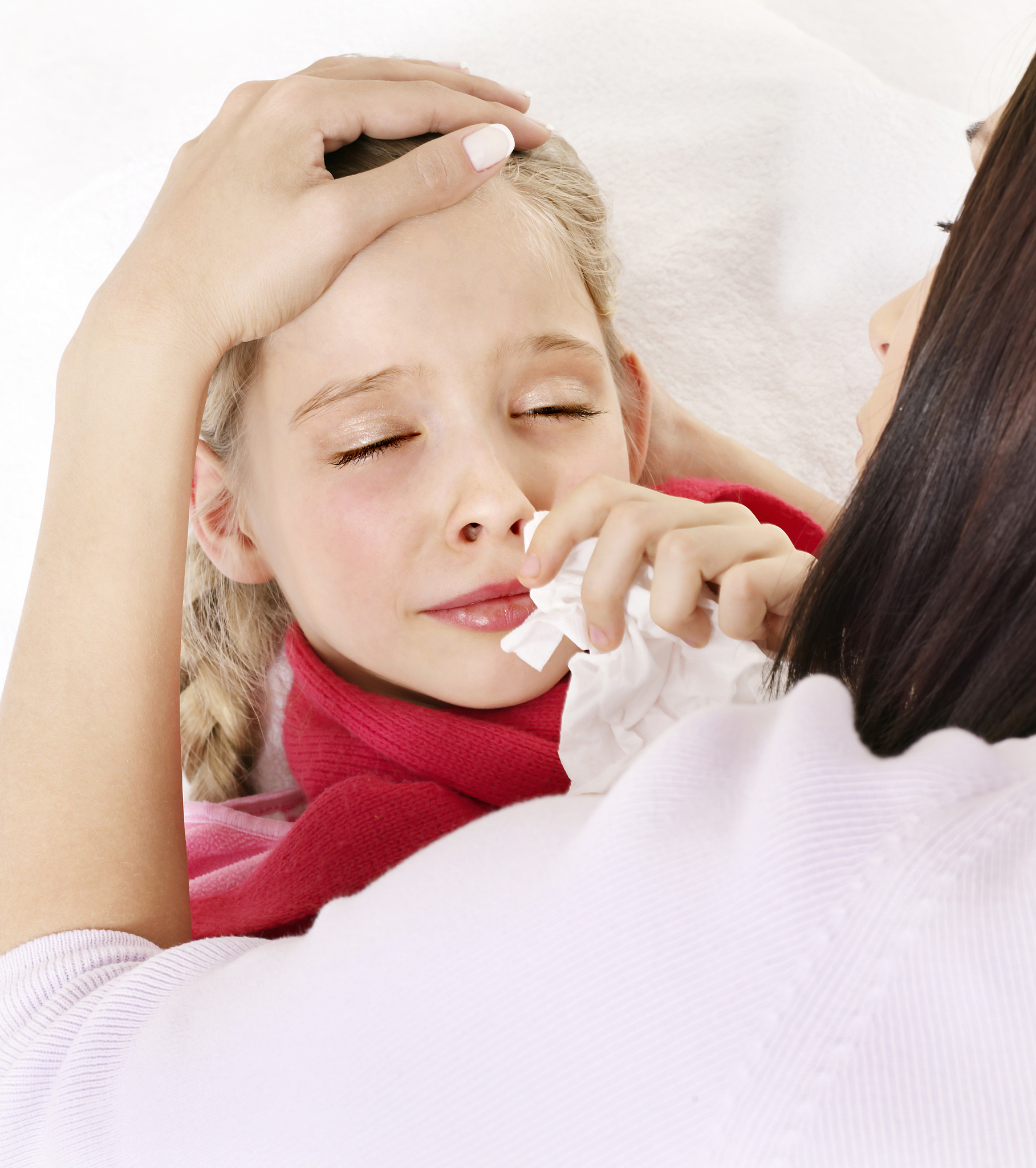 sick child with handkerchief.
