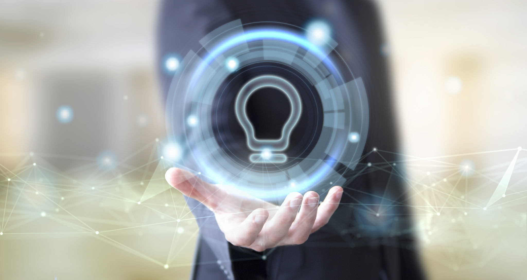 businessman with digital lightbulb icon