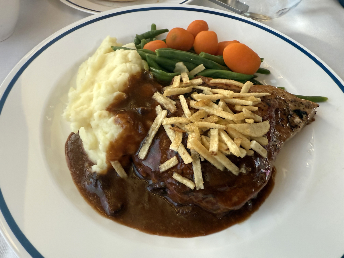 It is a can of cream of mushroom soup, can of beef broth, packet of dry onion soup and some a1 sauce