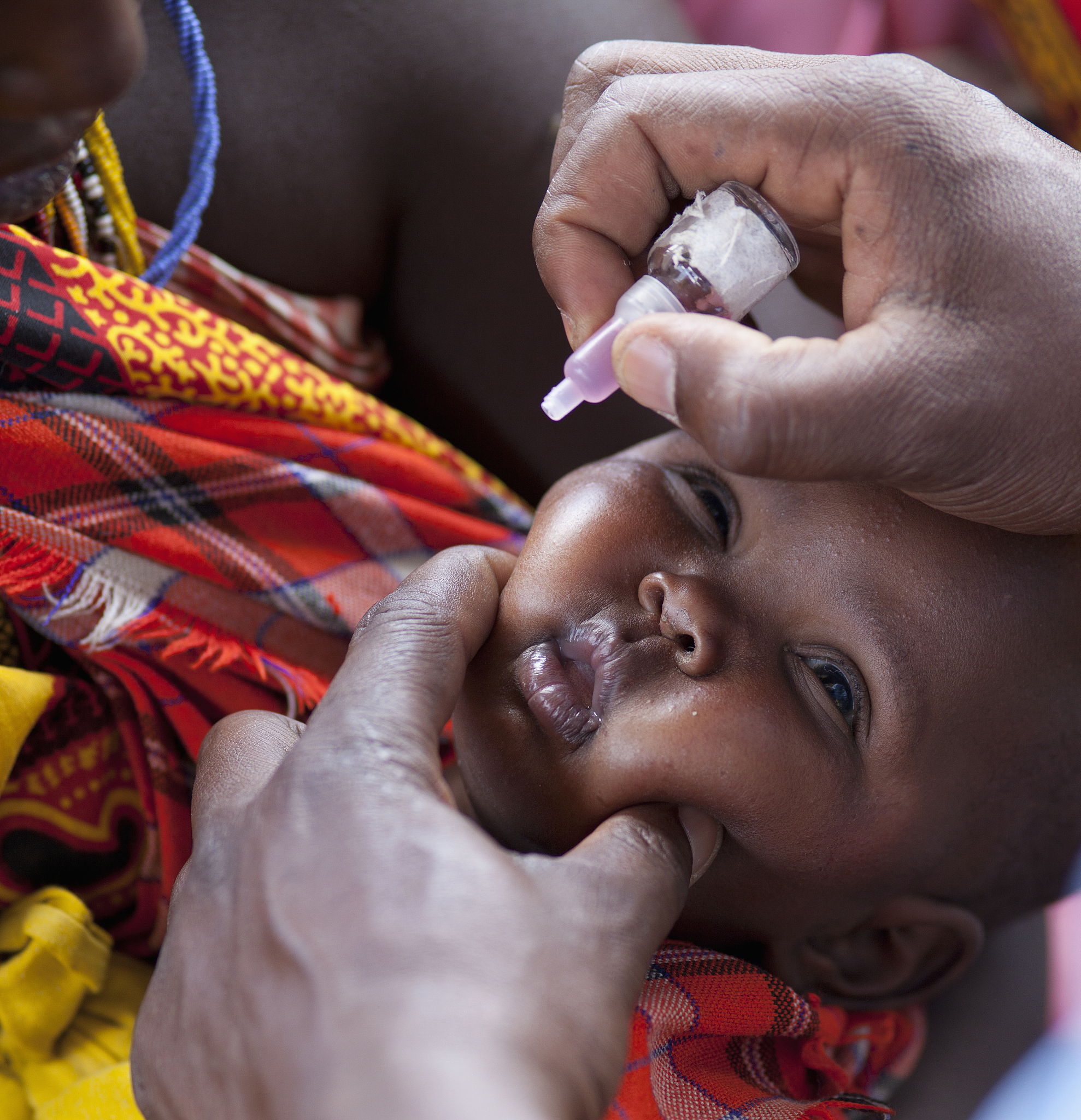 african baby receiving vaccination