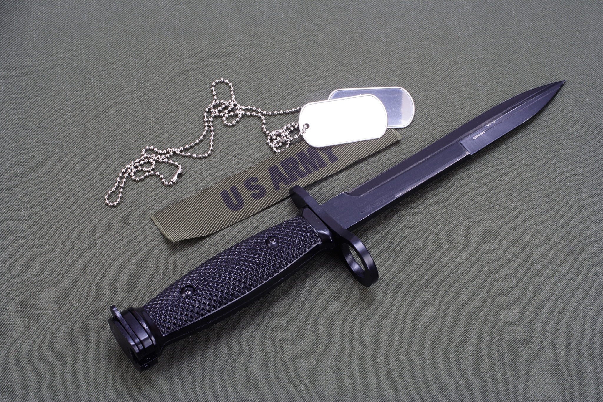 bayonet on us army uniform background