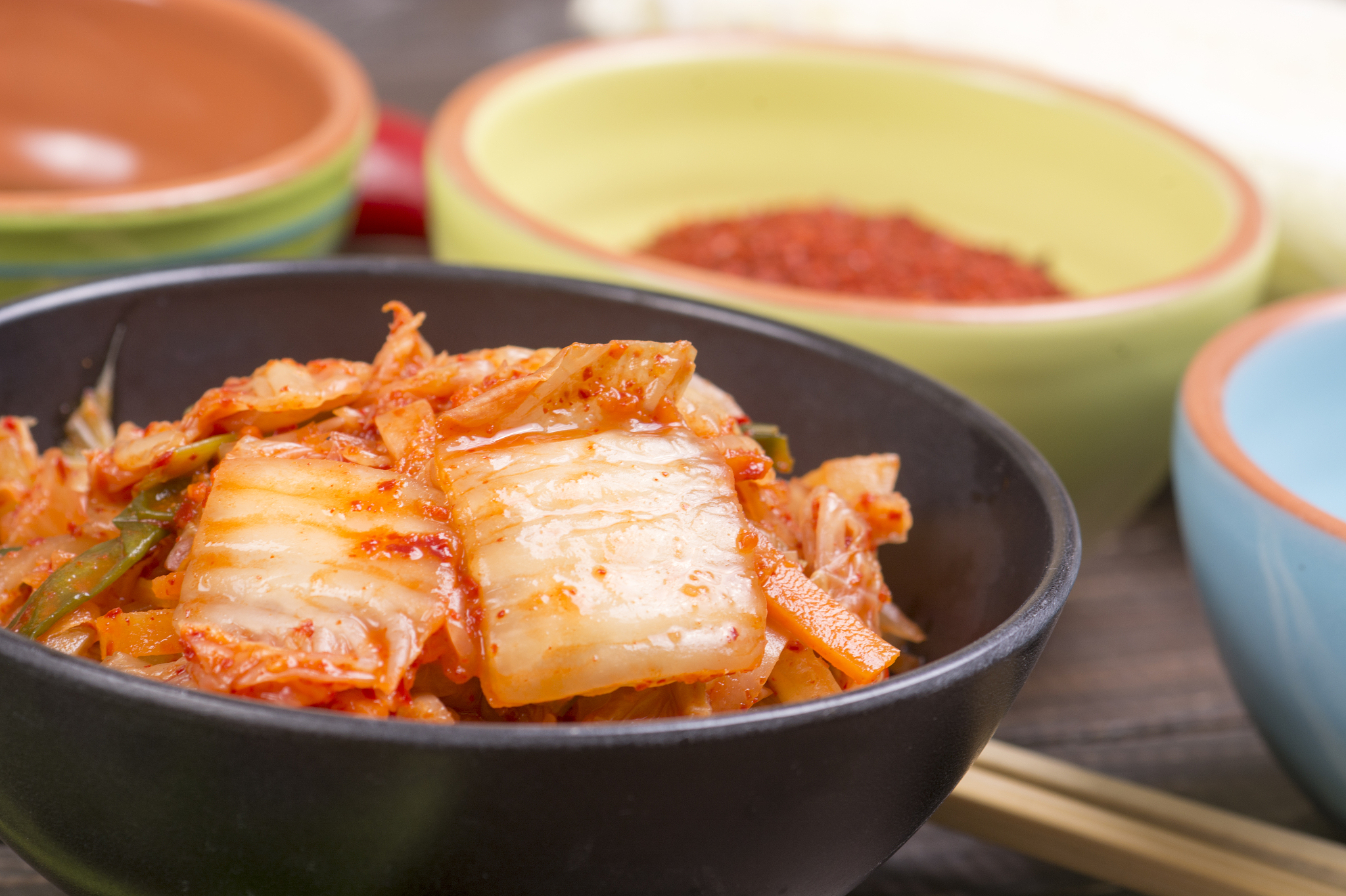 kimchi or kimchee on black plate