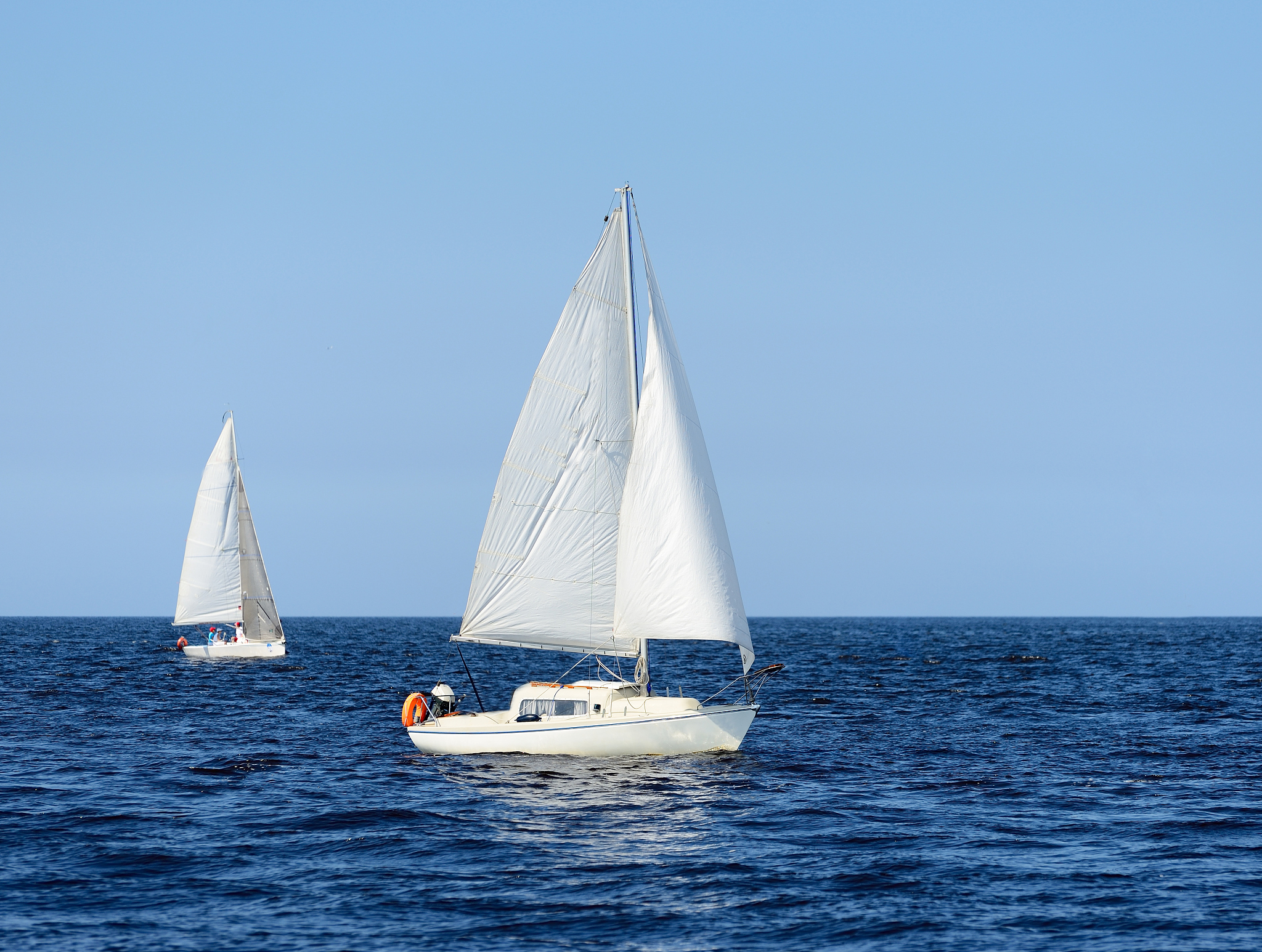 white yacht sailing