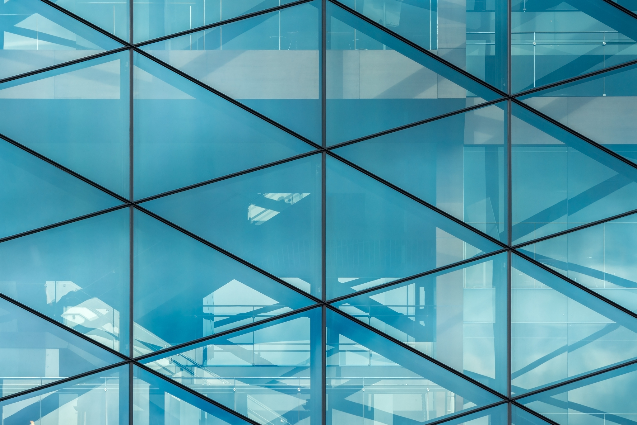 glass wall with reflections in the office building