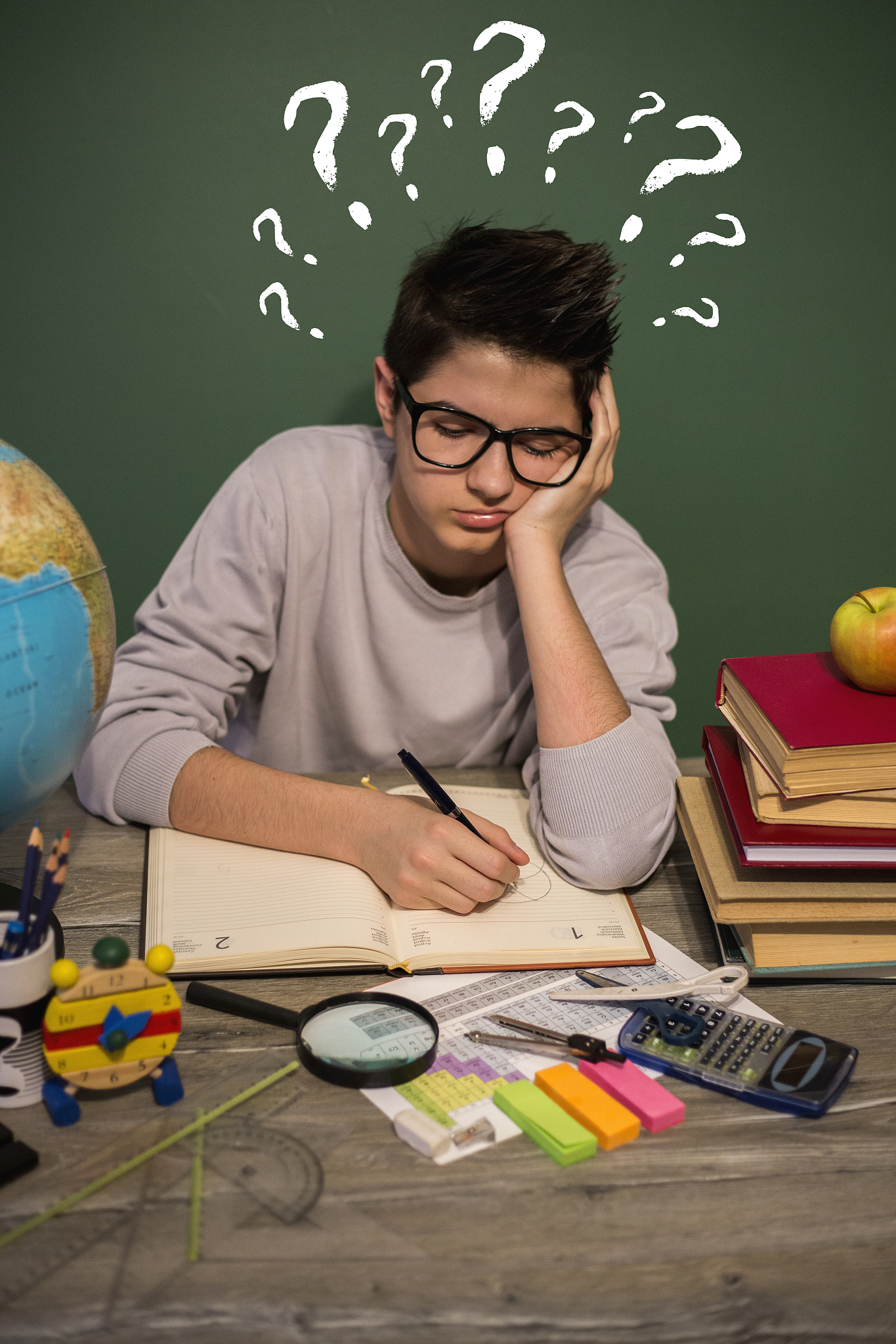 child thinking with question mark on blackboard