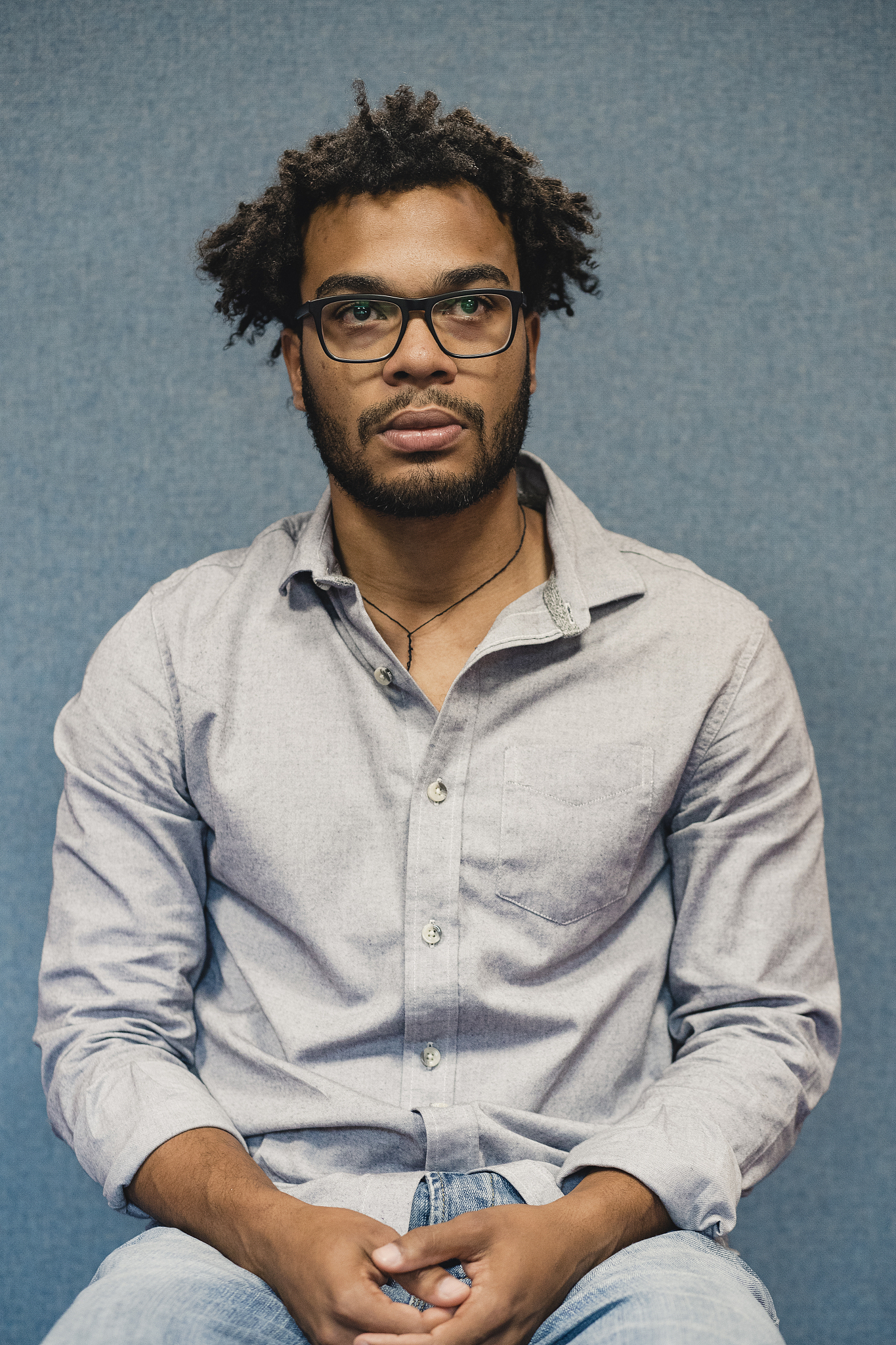 portrait of a young man looking anxious