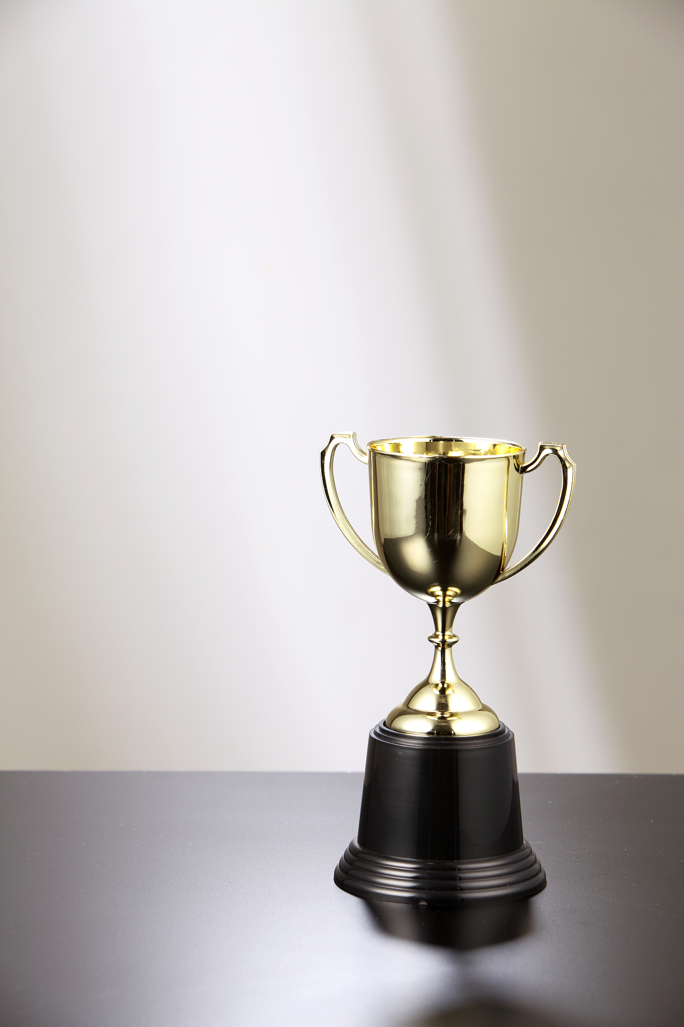 close-up of award on table against wall