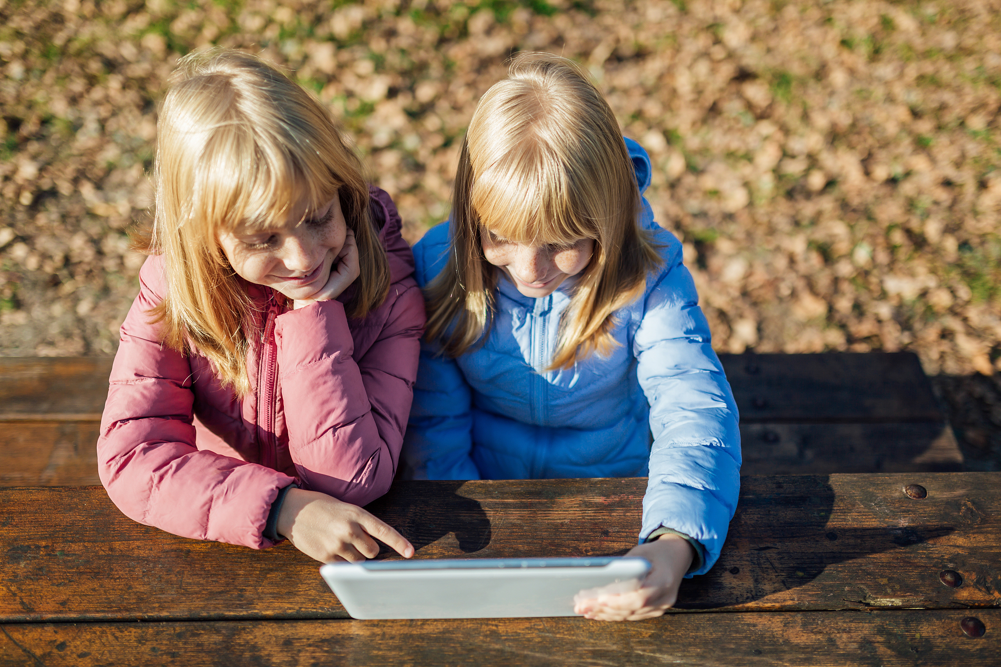 twin girls in the park