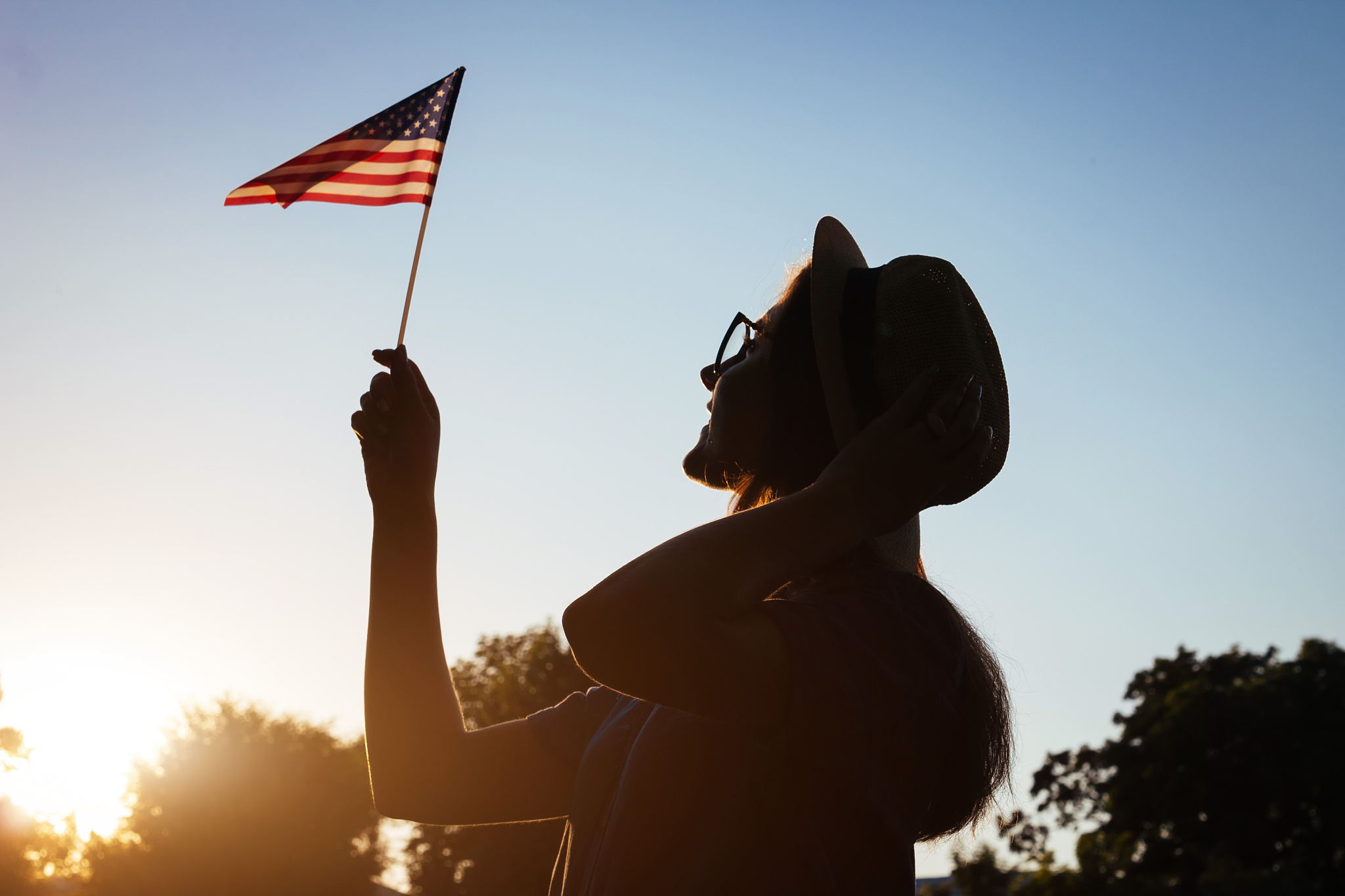 woman holding usa flag