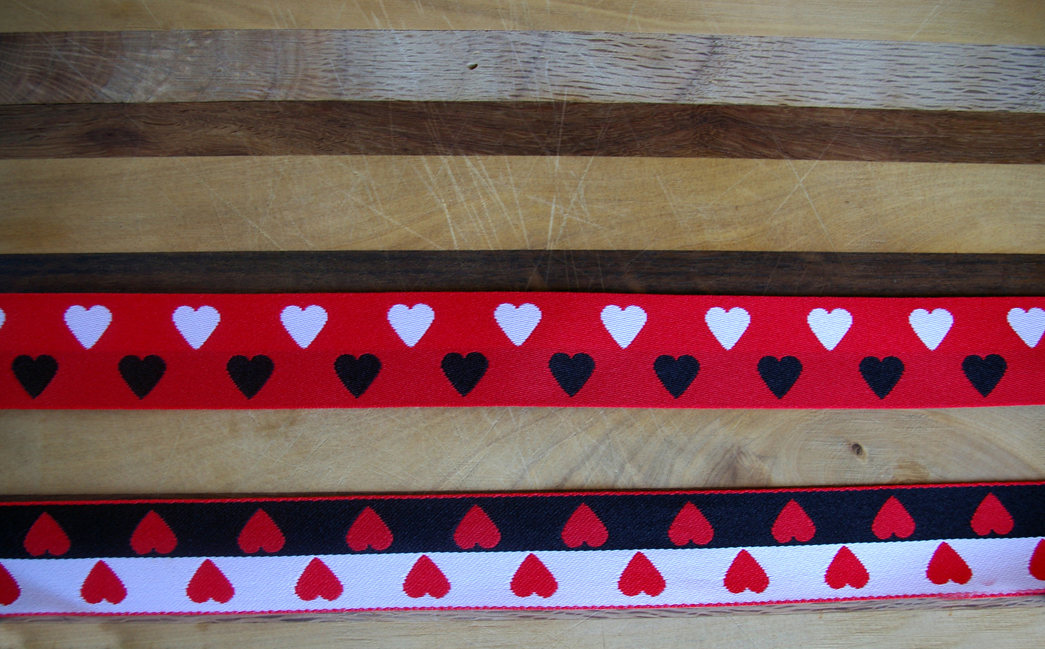 heart printed ribbon on wood background
