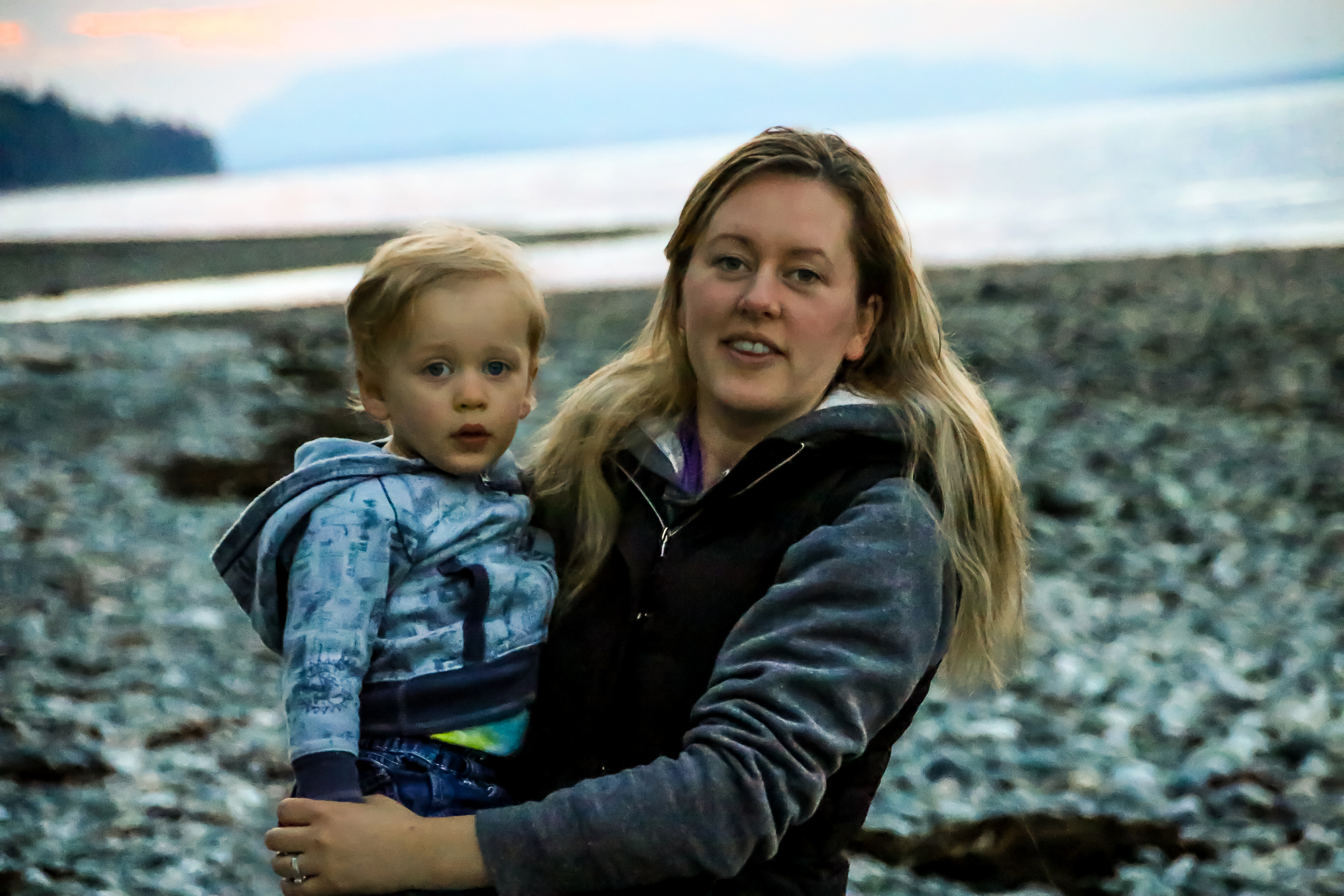 mother and son on beach hike