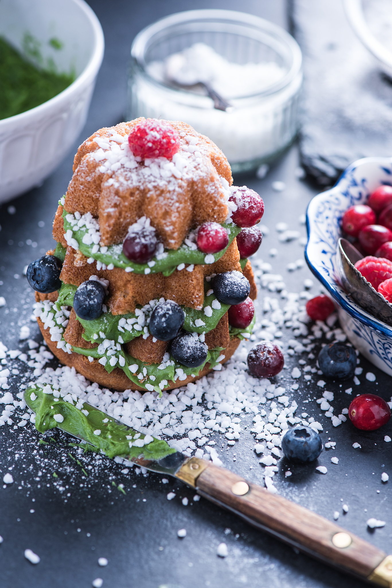 decorating christmas tree cake with fruits
