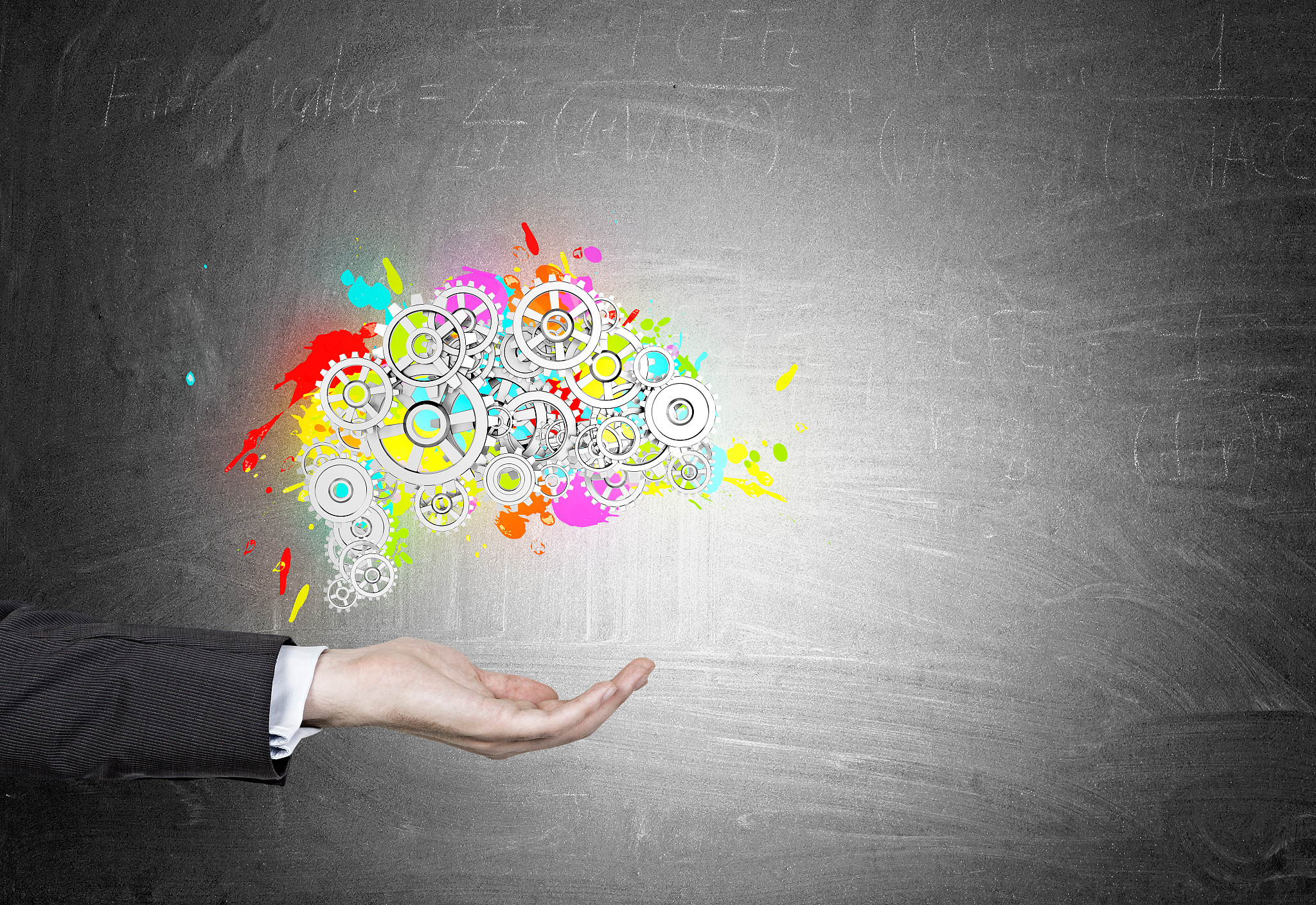 man s hand, brain and gears