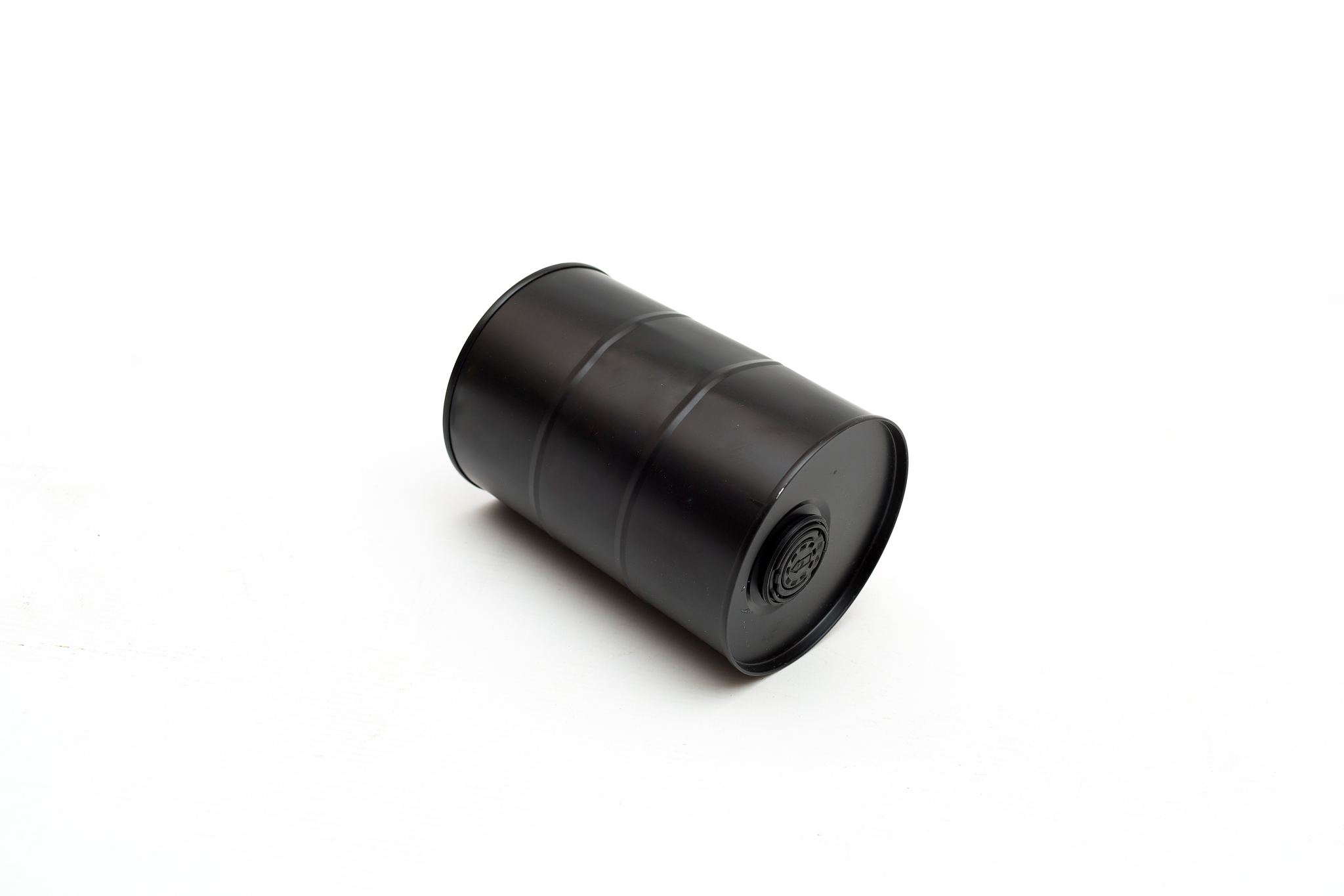 a black barrel of oil on a white background. ecology and environ