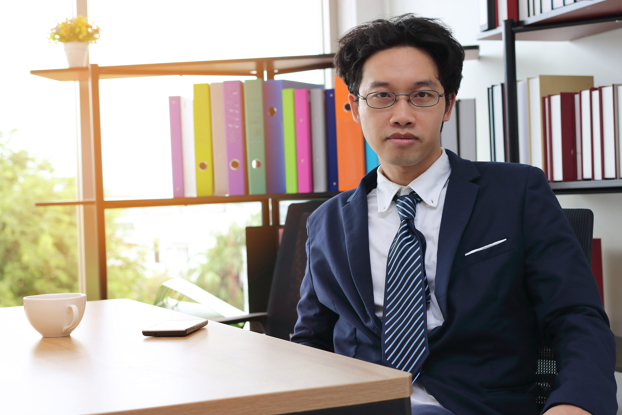 anxiety young asian business man in workplace of office.