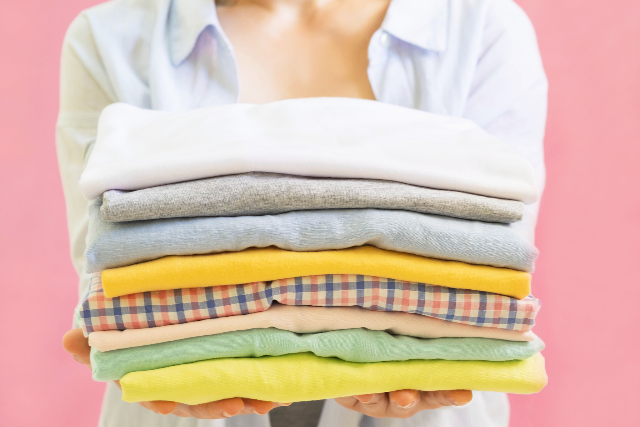 close-up of woman holding clothing